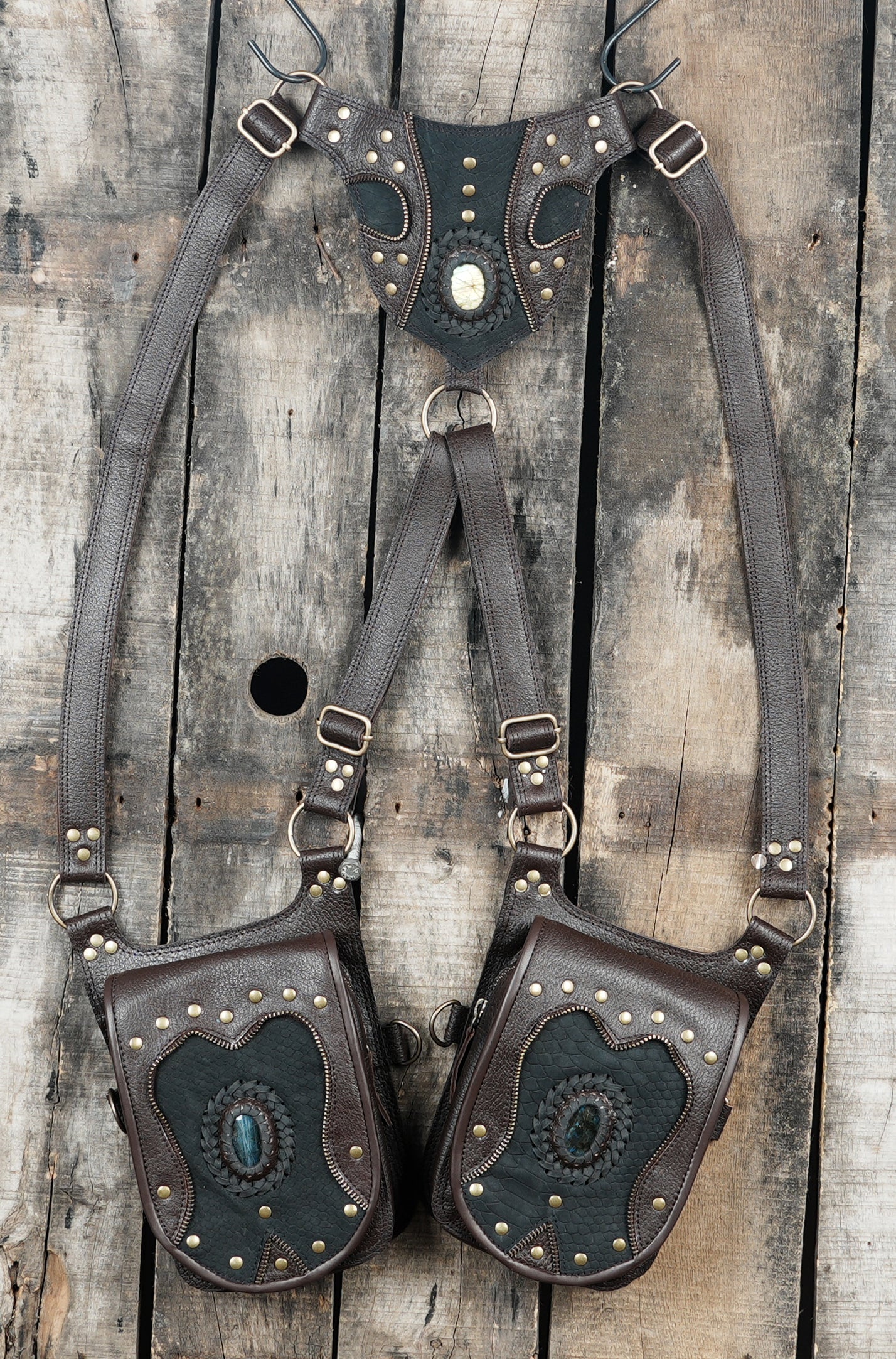 Tribal inspired leather harness bag with stone embellishments and rivets