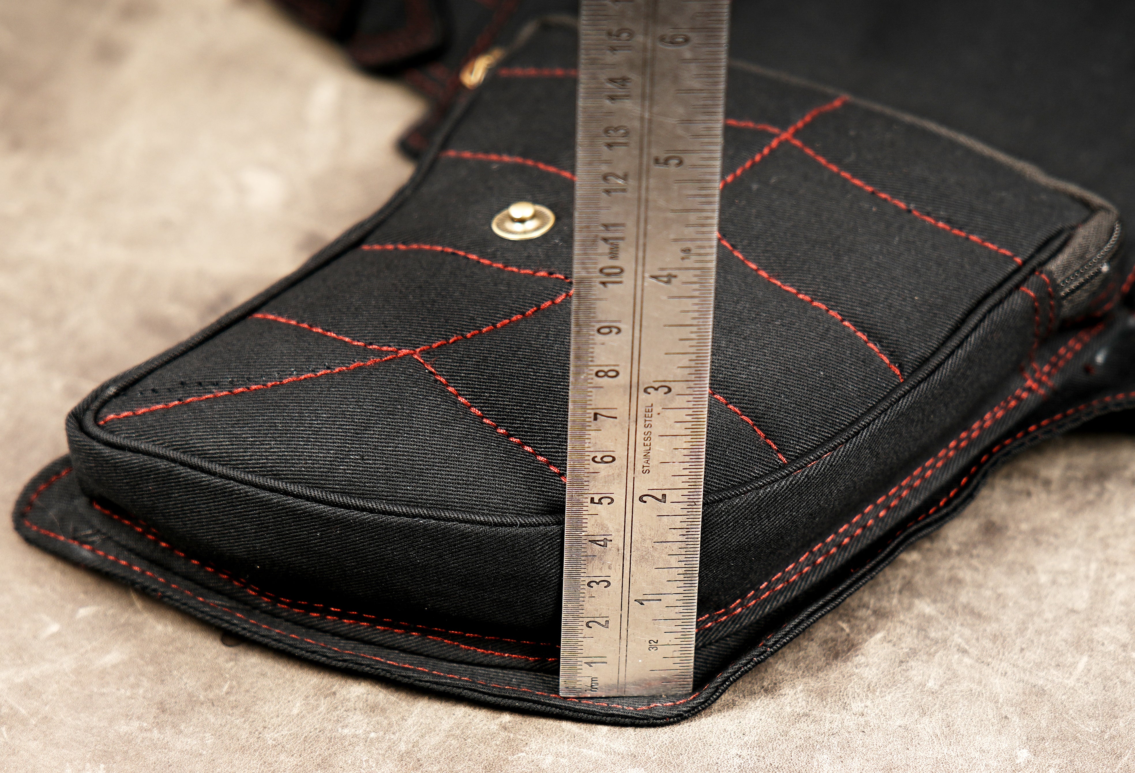 Flat lay of handmade canvas festival hip bag with leaf shape flap
