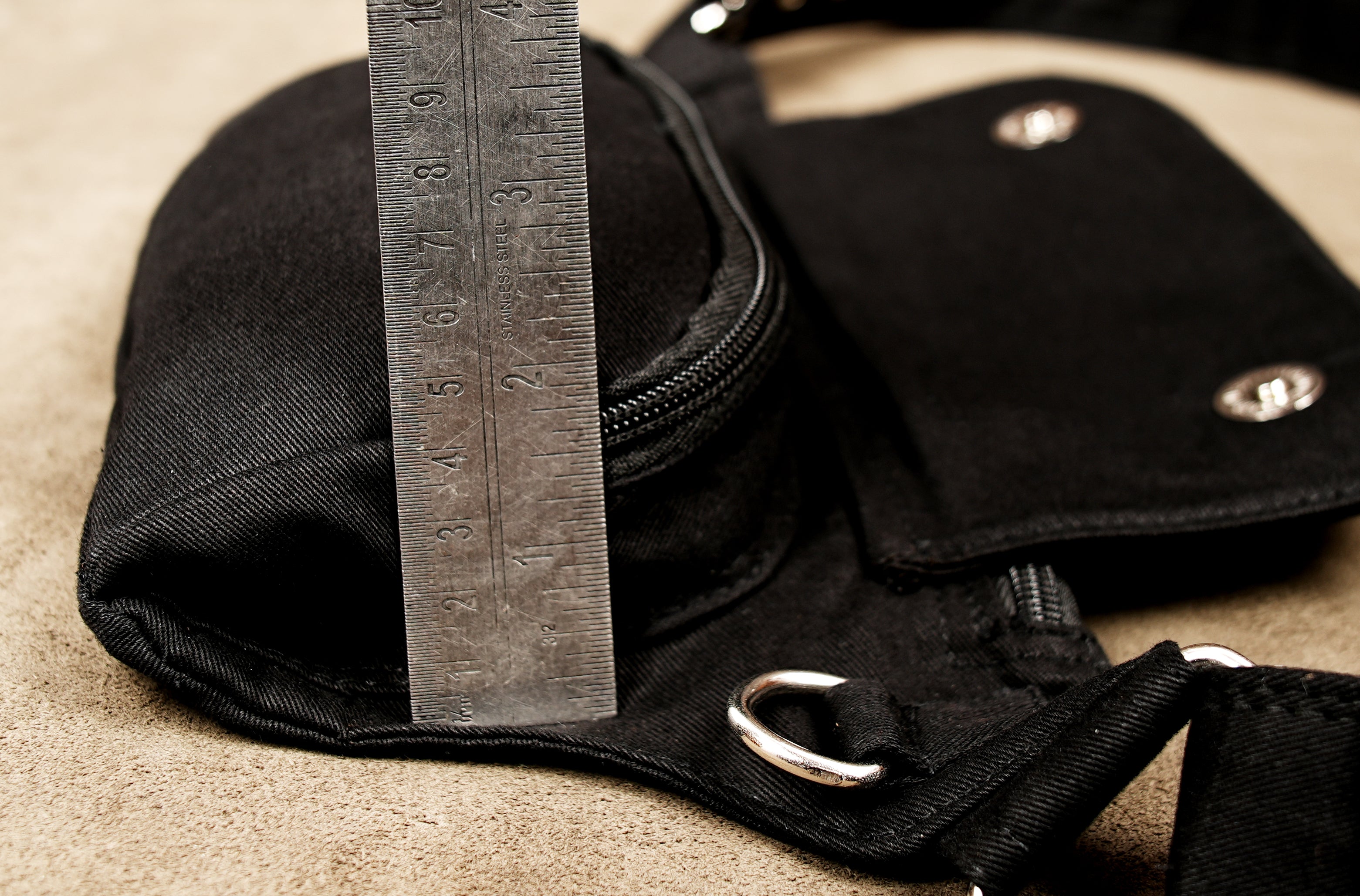 Trendy alternative fashion waist pack made from durable black cotton fabric.
