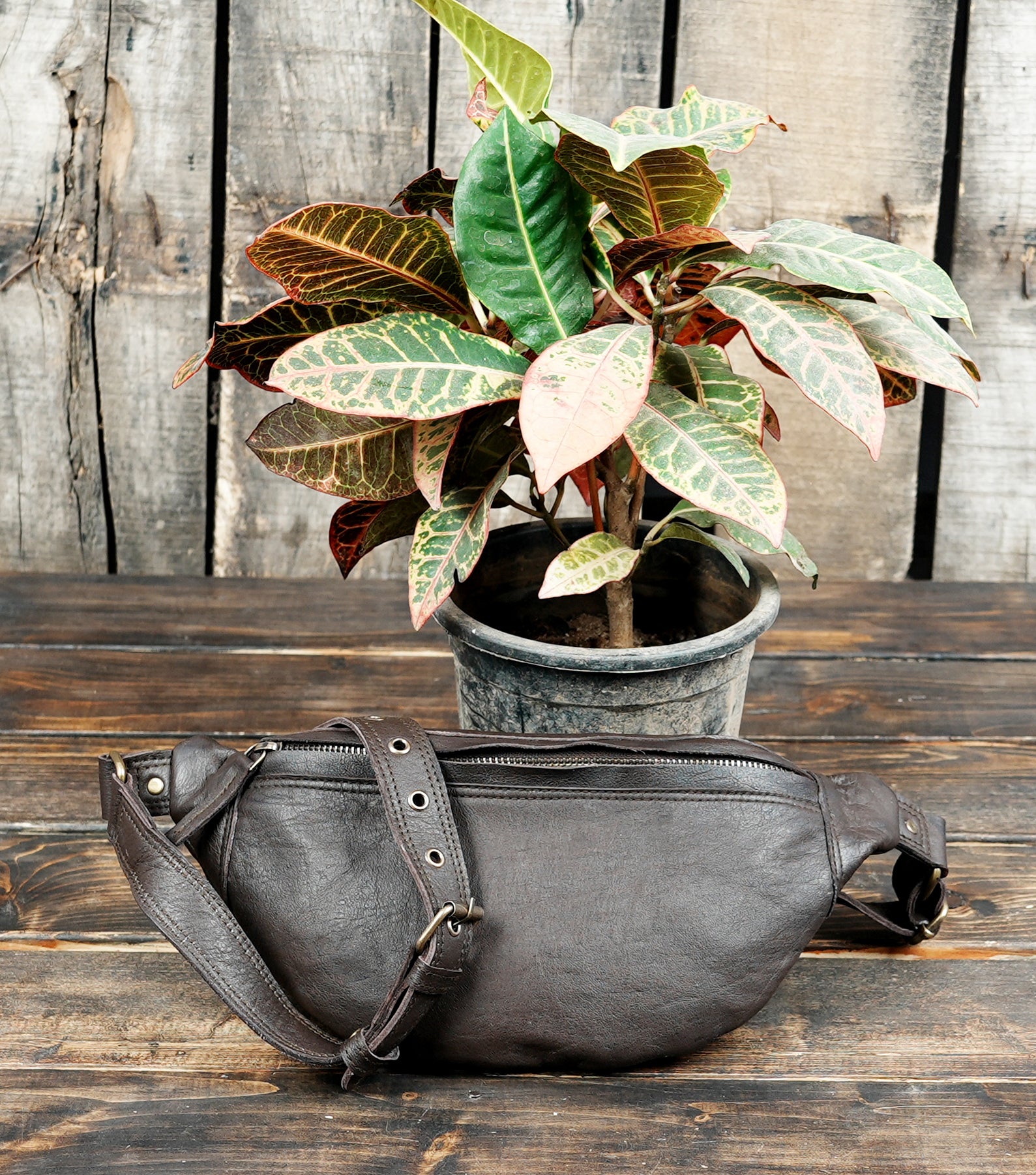 Utility leather waist pouch for travel and daily essentials
