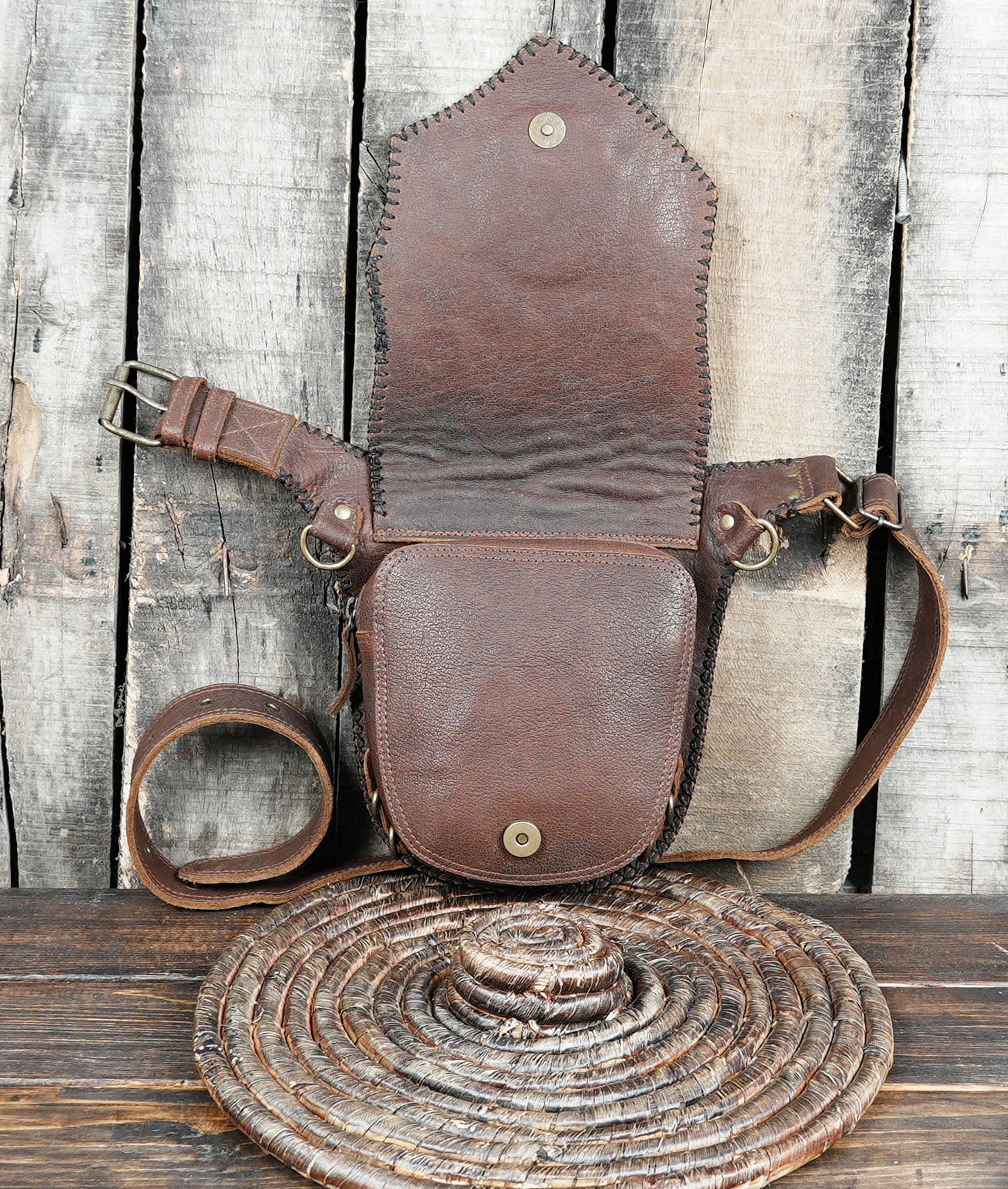 Brown leather utility belt with handmade woven pouch
