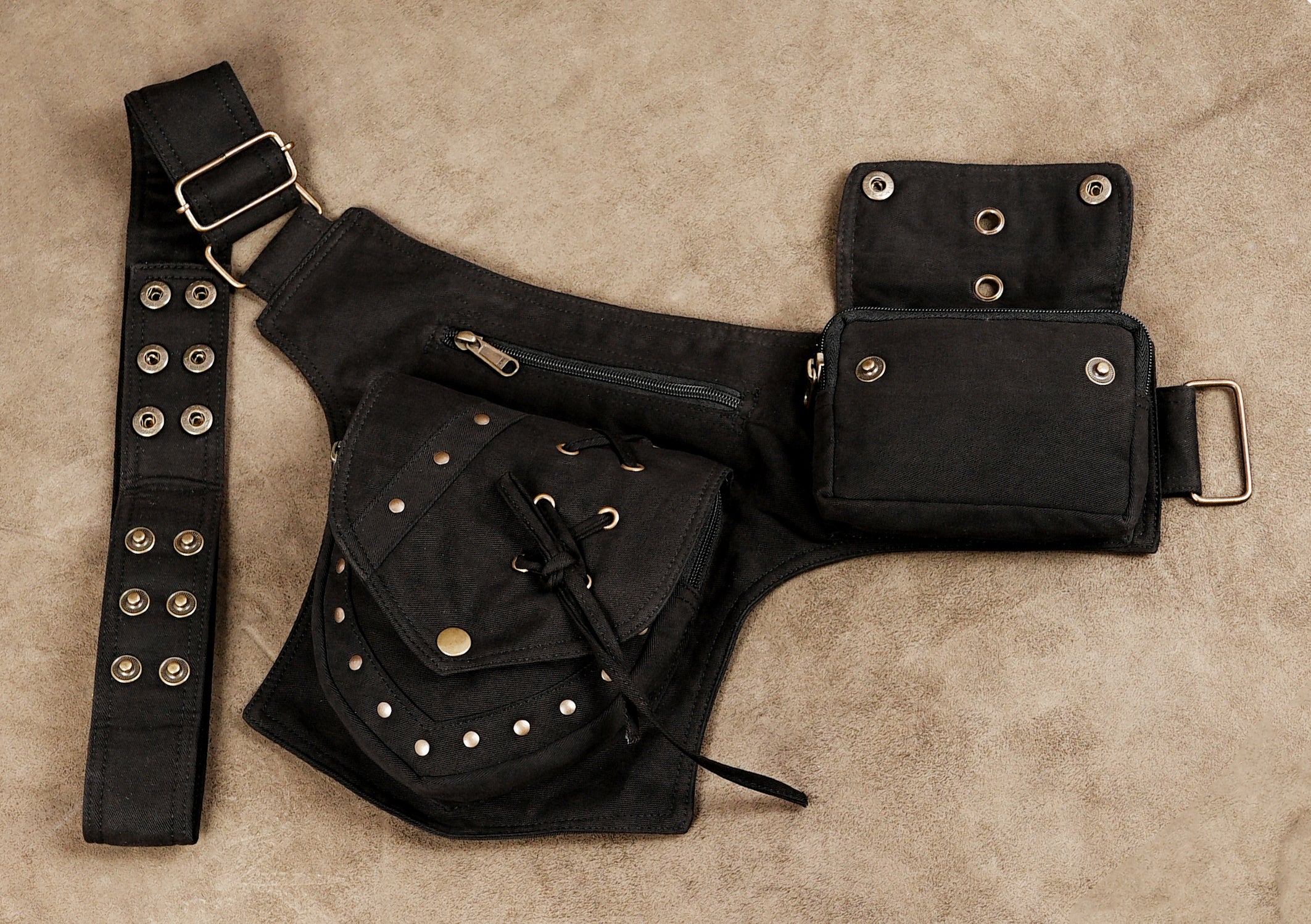 Black cotton travel hip belt with secure zip pockets and snaps