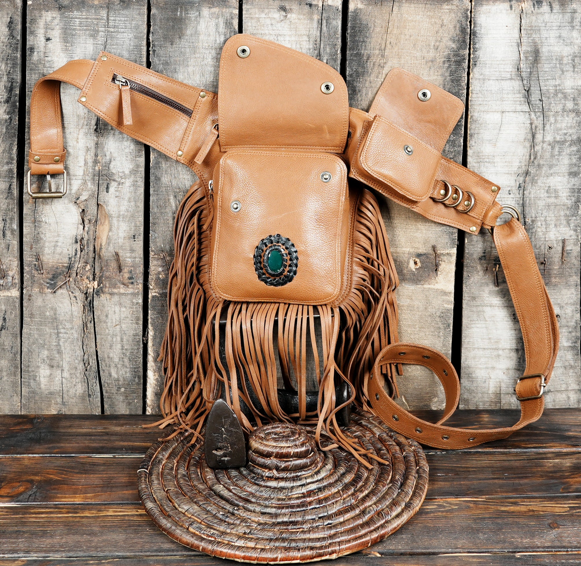 Leather waist belt with gemstone accent and long fringe