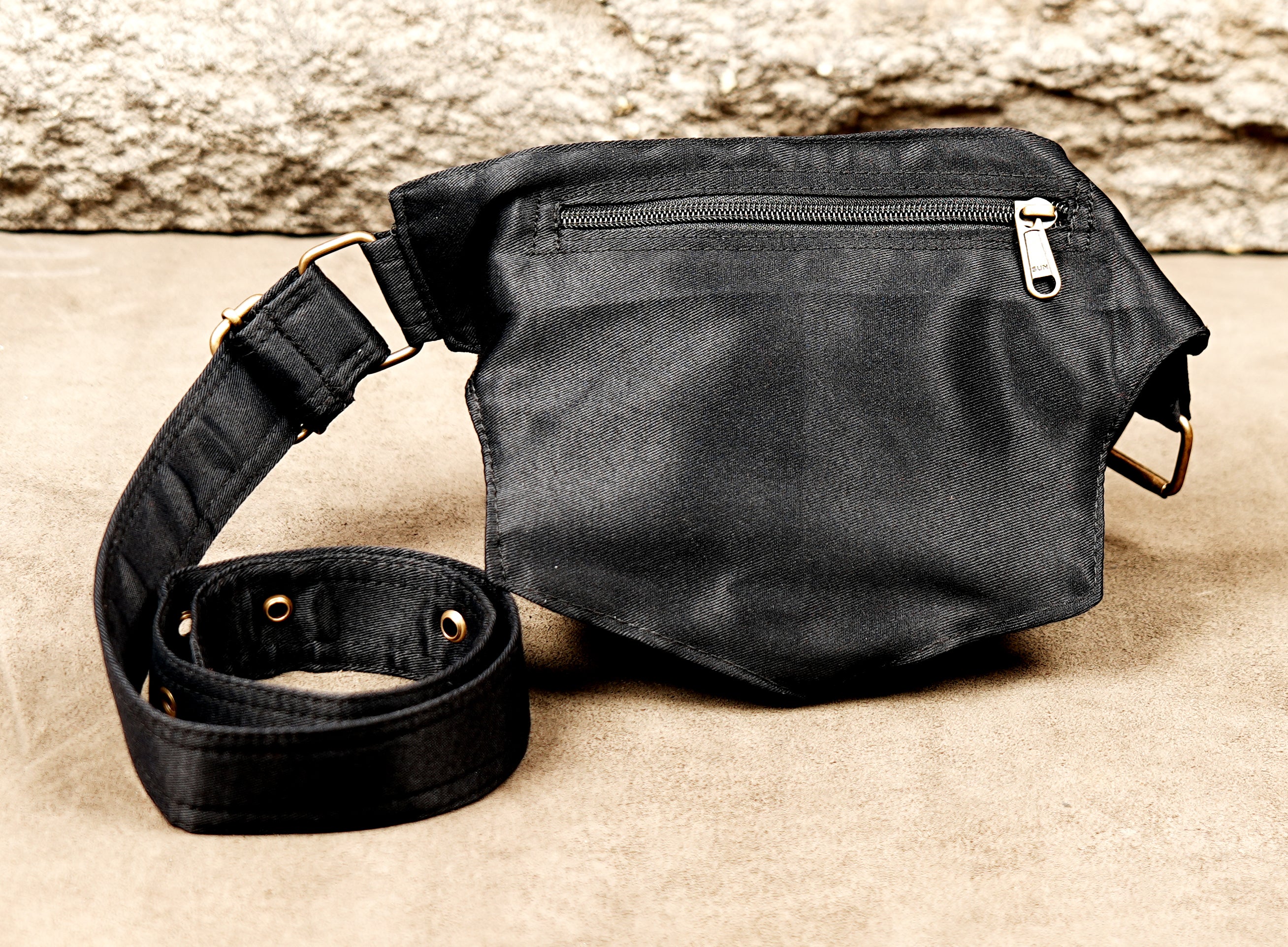 Festival-ready black cotton waist pack with secure compartments