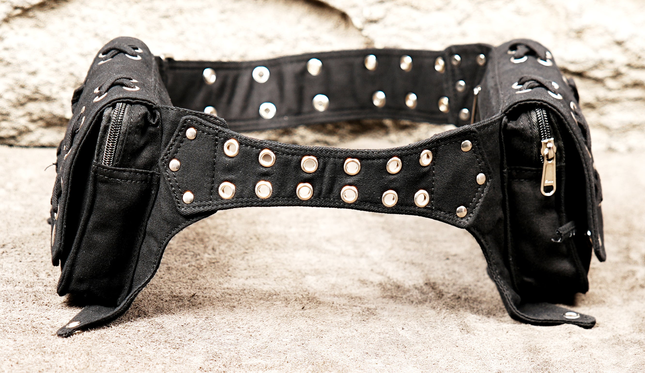 Durable black canvas utility belt holster with heavy-duty hardware.