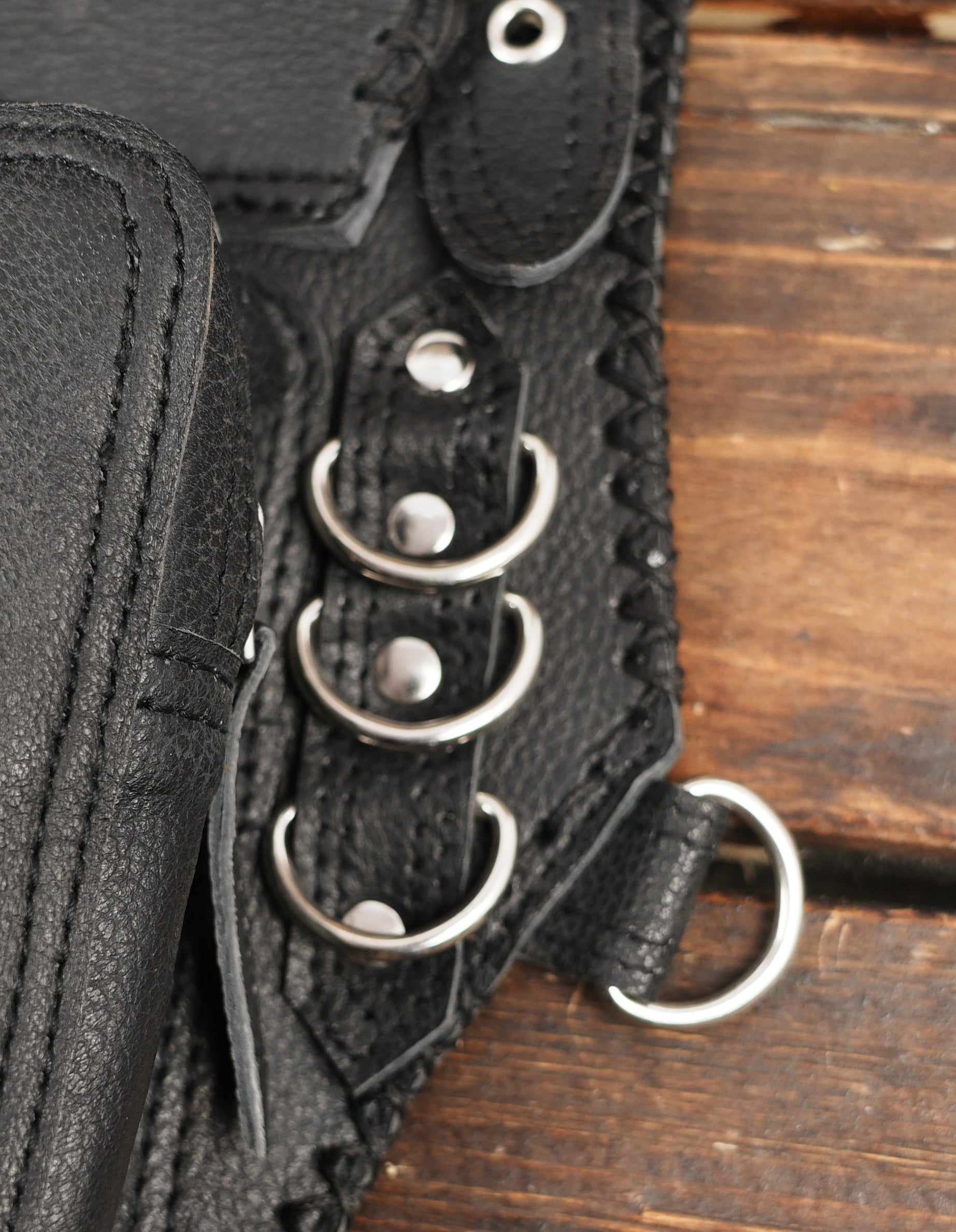 Darkwear leather harness with structured pouches and polished stone accents