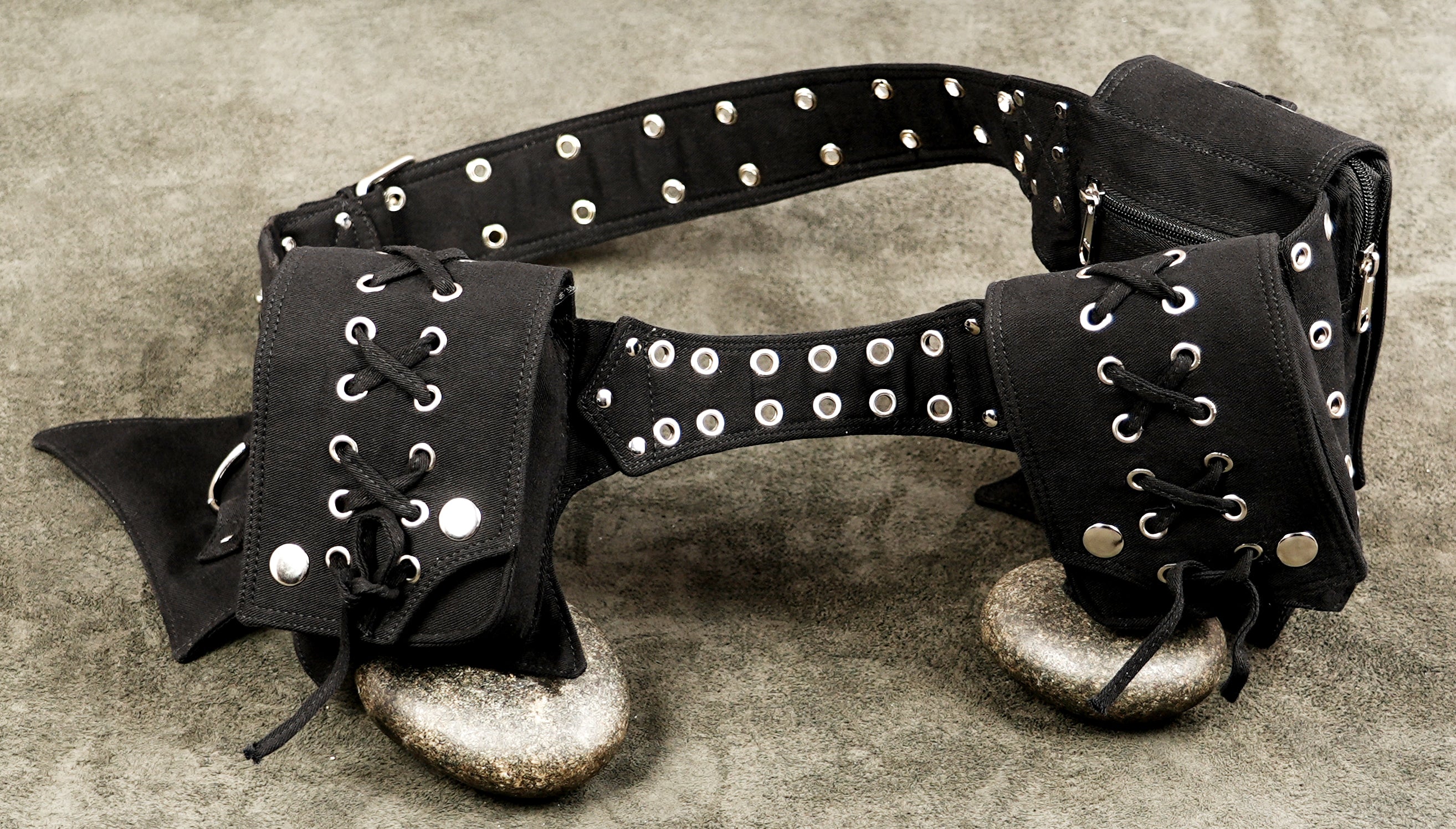 Rave and festival hip belt in black canvas with stud and eyelet accents