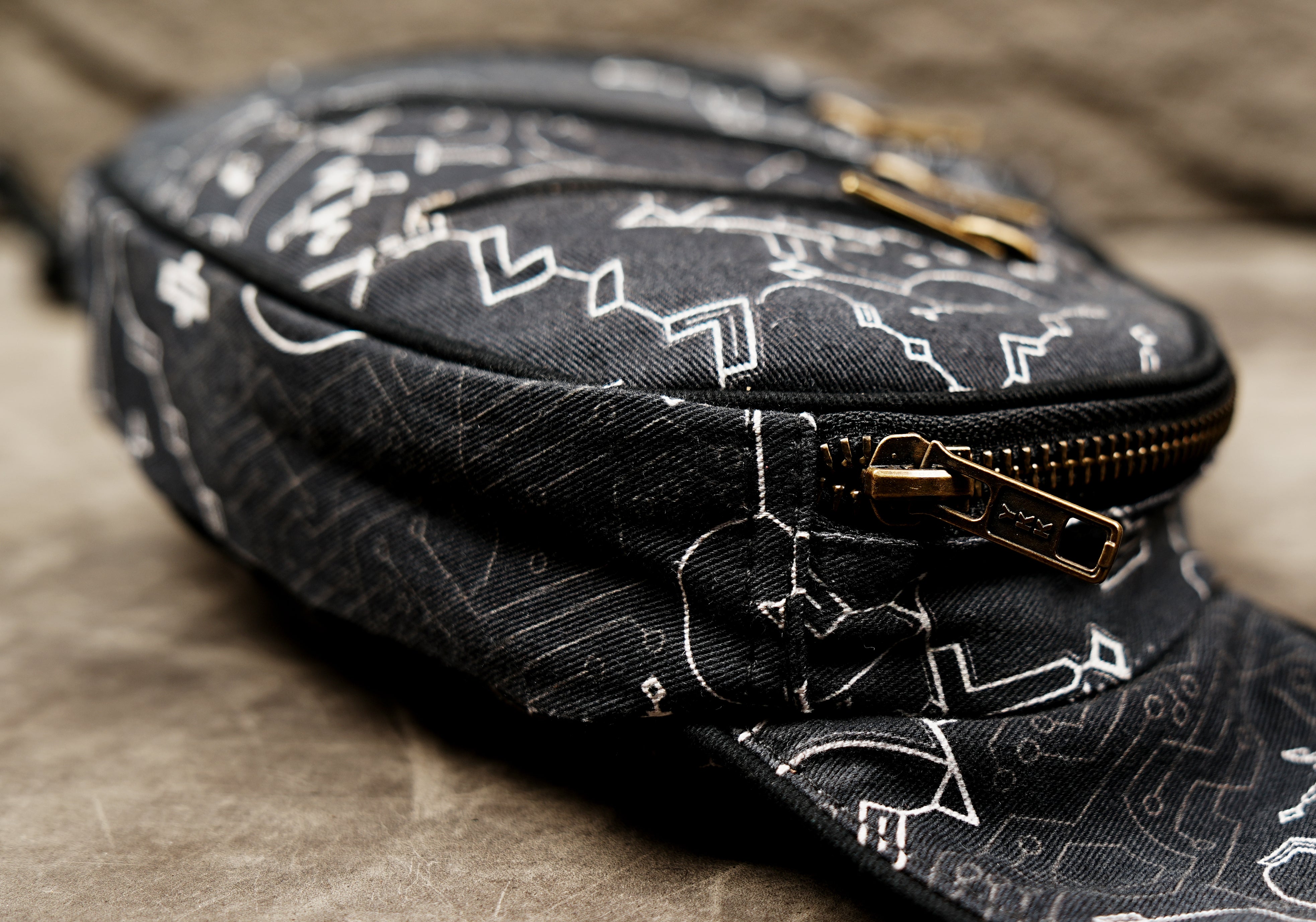 Rave style crossbody bag with black and white geometric print