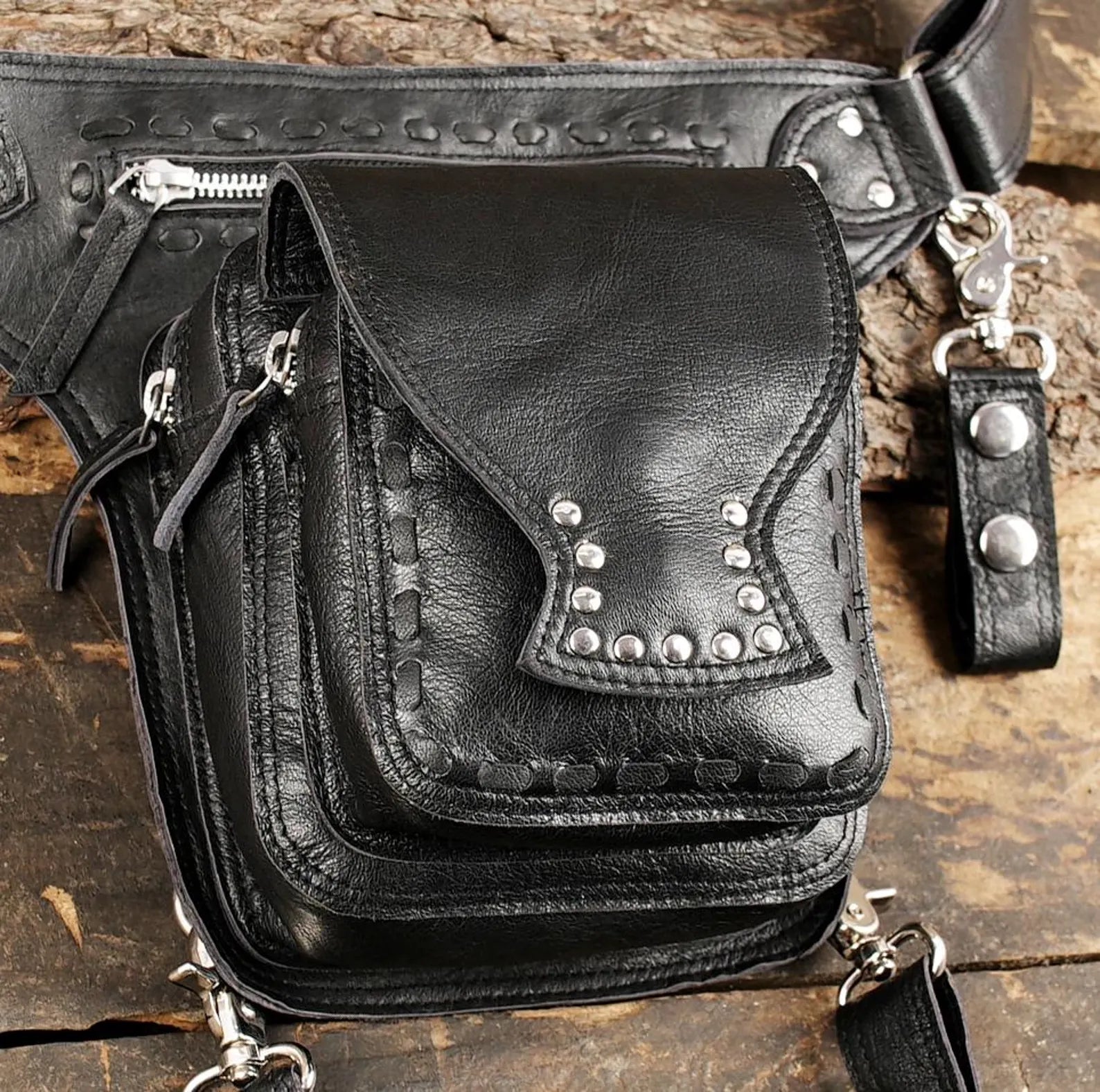 Black Leather Motorcycle Leg Bag with Studded Pocket and Adjustable Strap