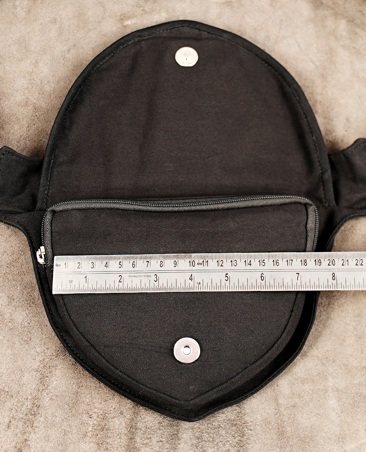 Durable black cotton festival bag with zipper closure