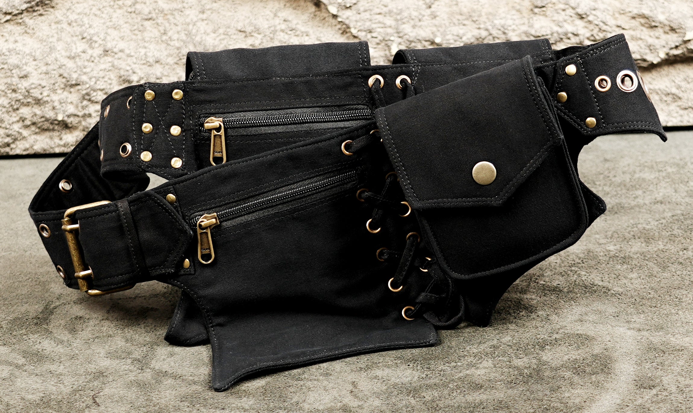Black boho festival waist belt with decorative studs and functional pouches