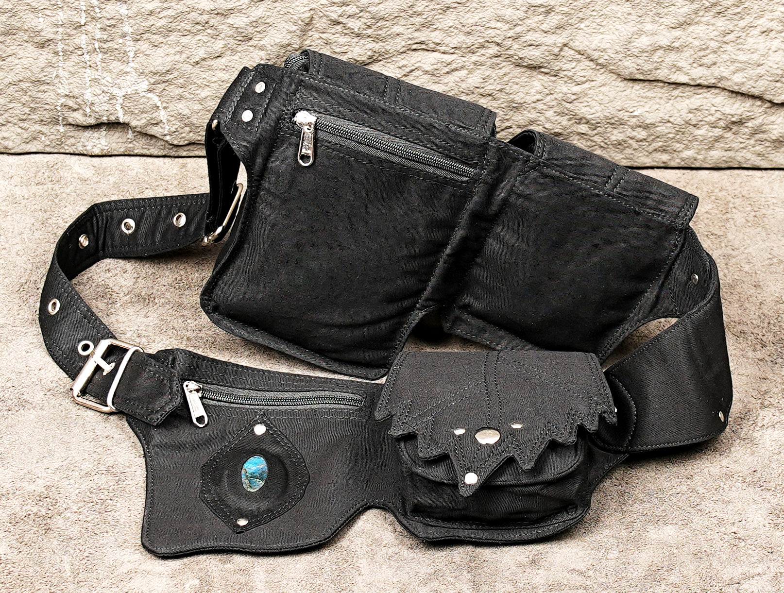 Rock and roll style black studded hip pouch belt with urban street fashion appeal.