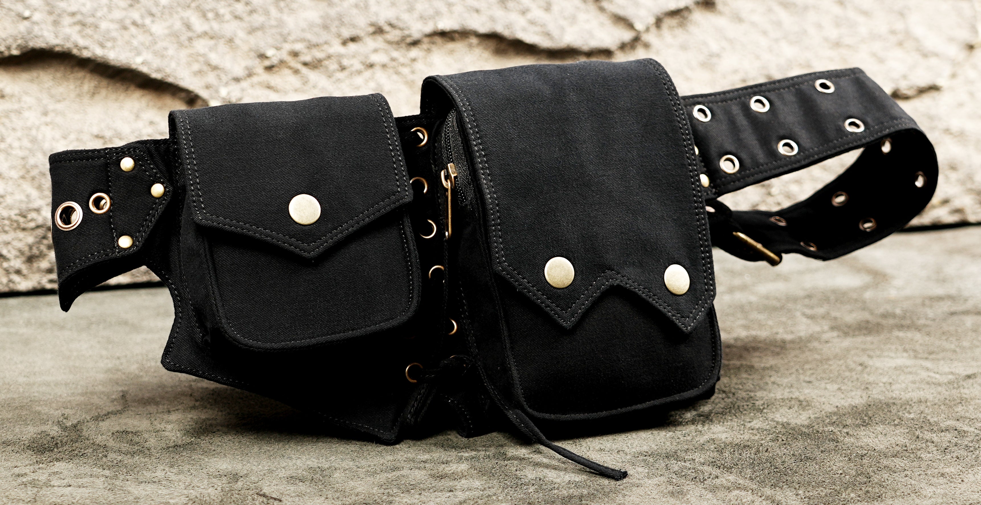 Black cotton belt bag with multiple compartments for travel and festivals