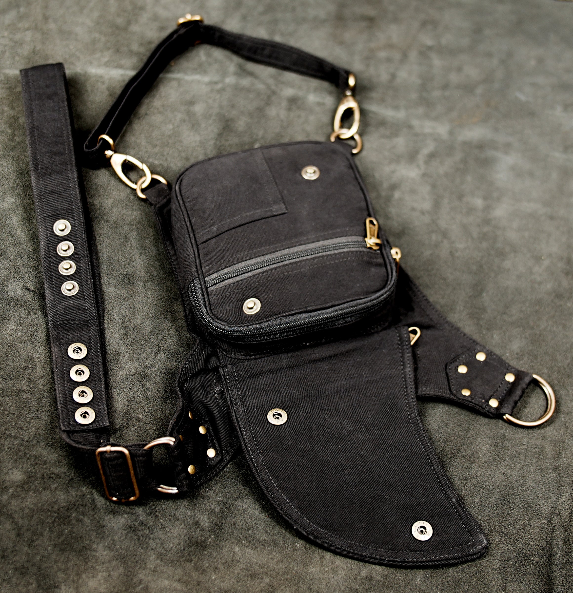 Black cotton thigh holster pouch with metal buckle and swivel snap hooks