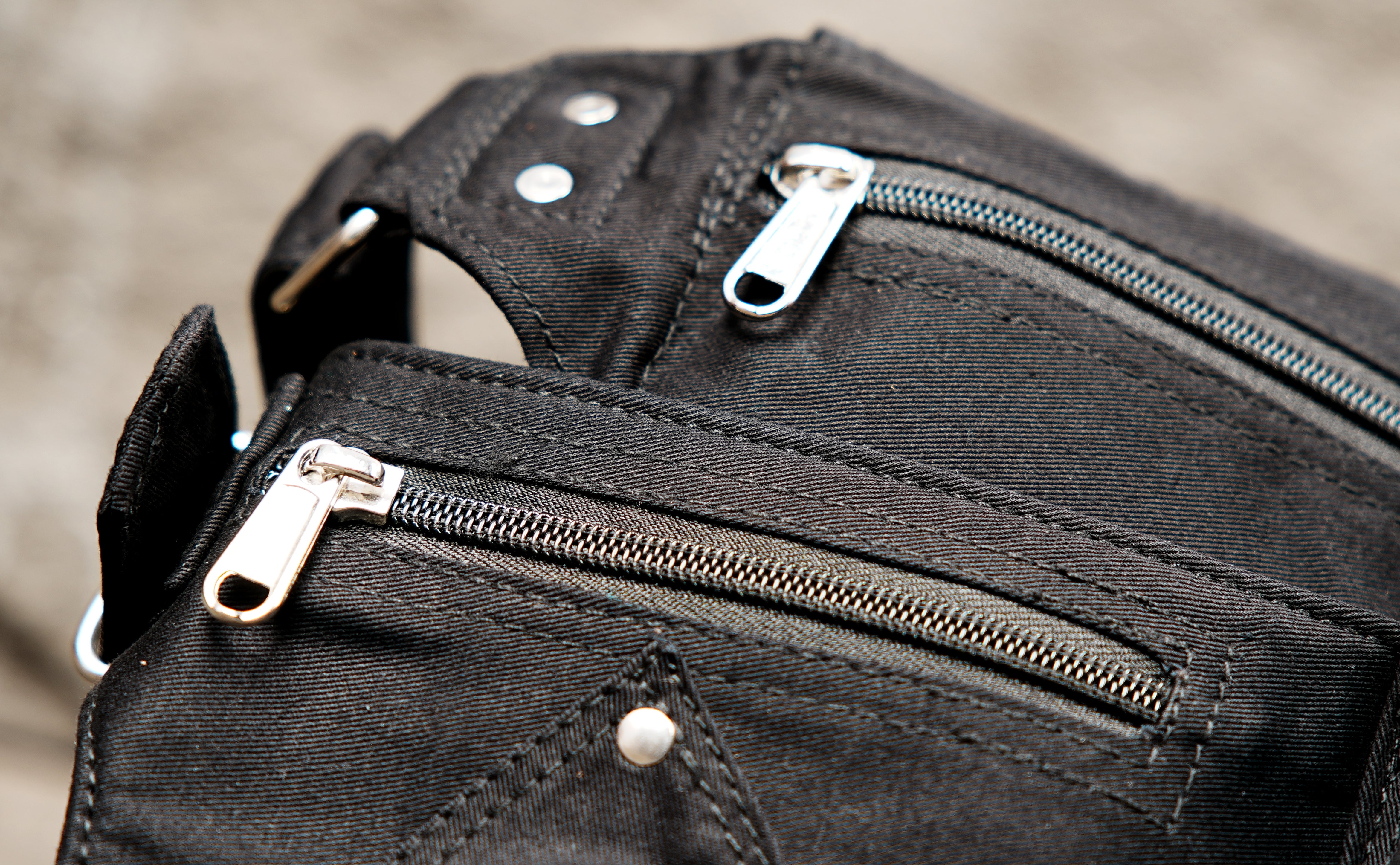 Durable black canvas utility belt holster with heavy-duty hardware.