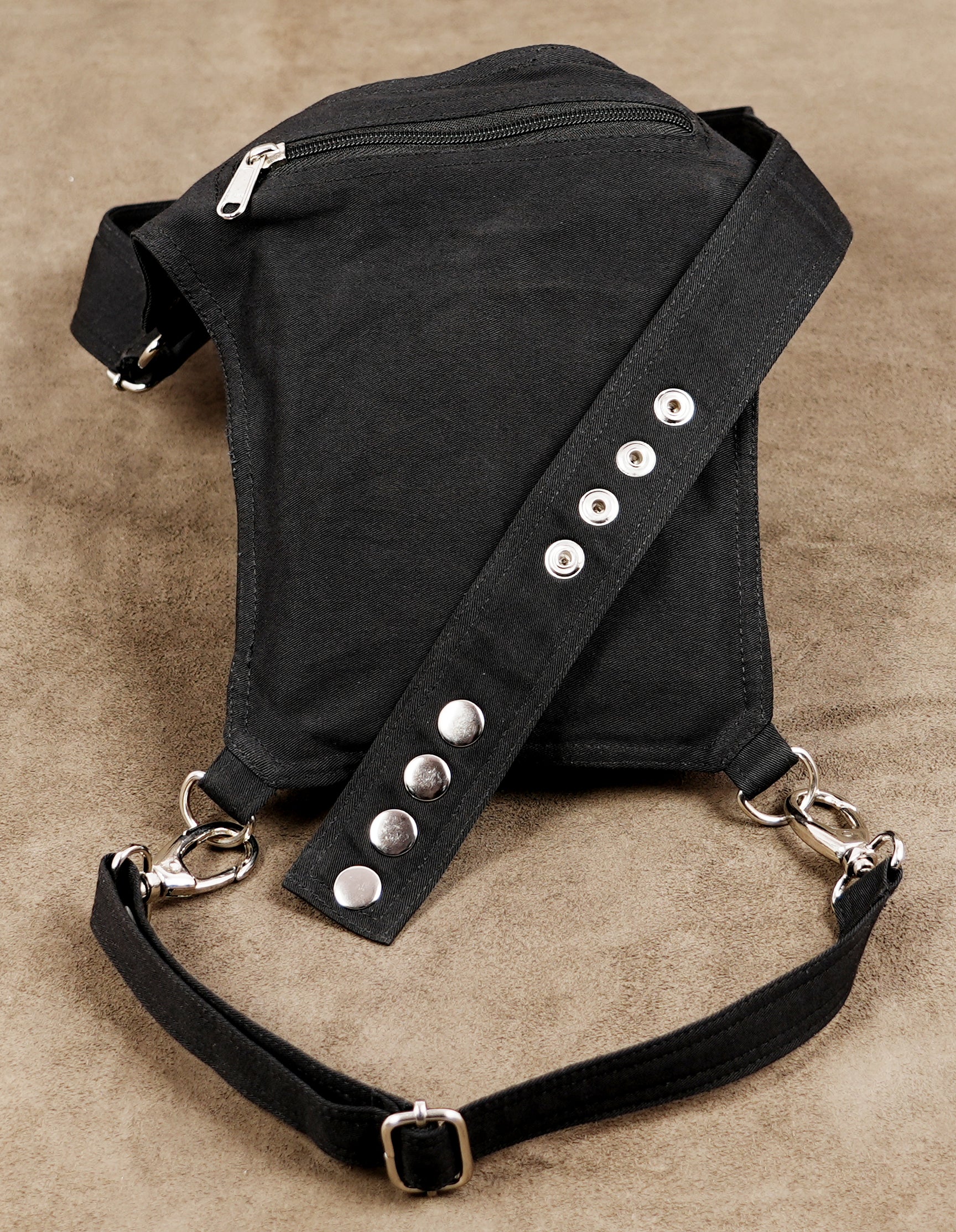Black waist belt bag with detachable thigh strap and clip hooks