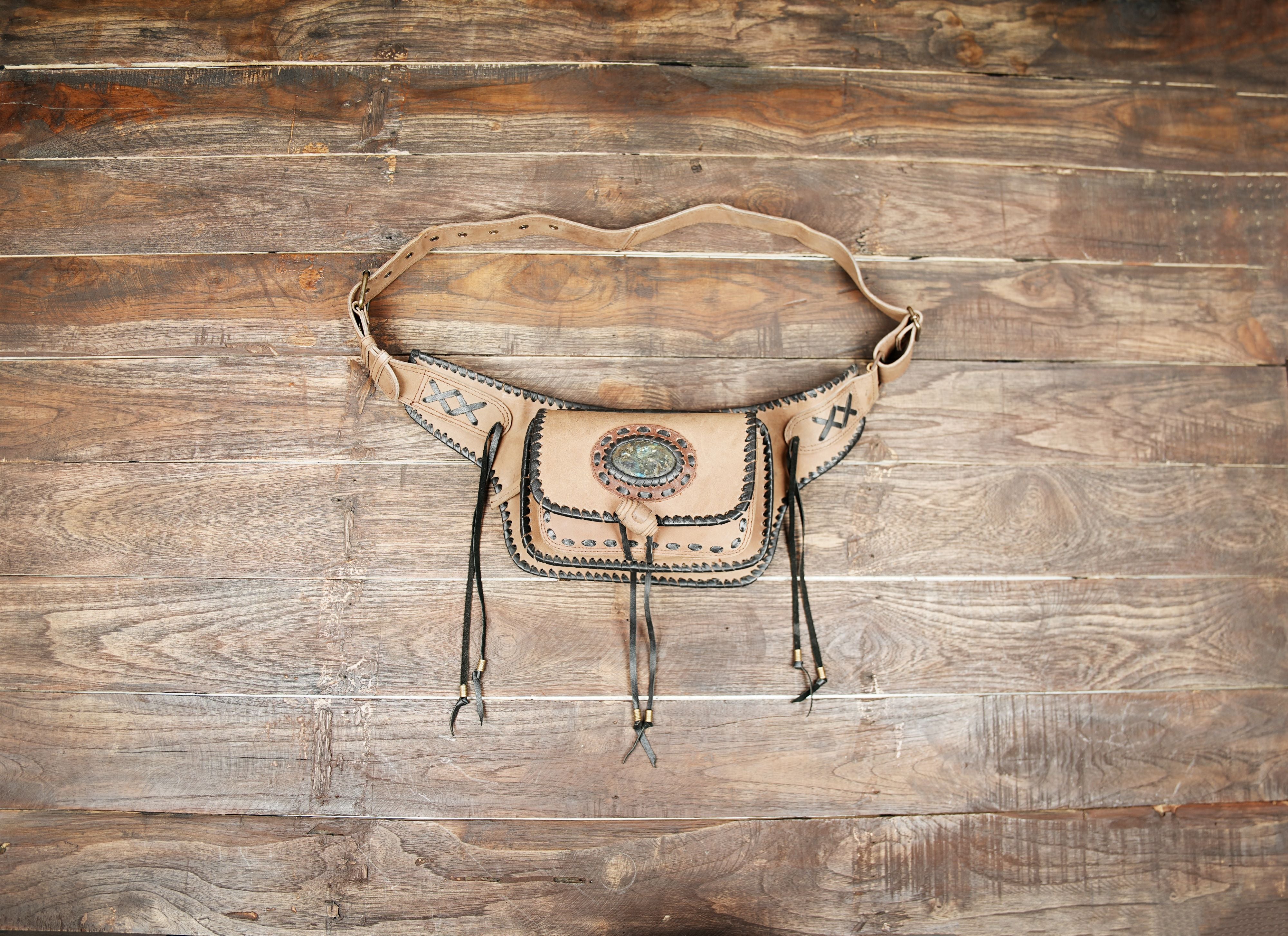 Handmade leather waist belt pouch with decorative stone centerpiece