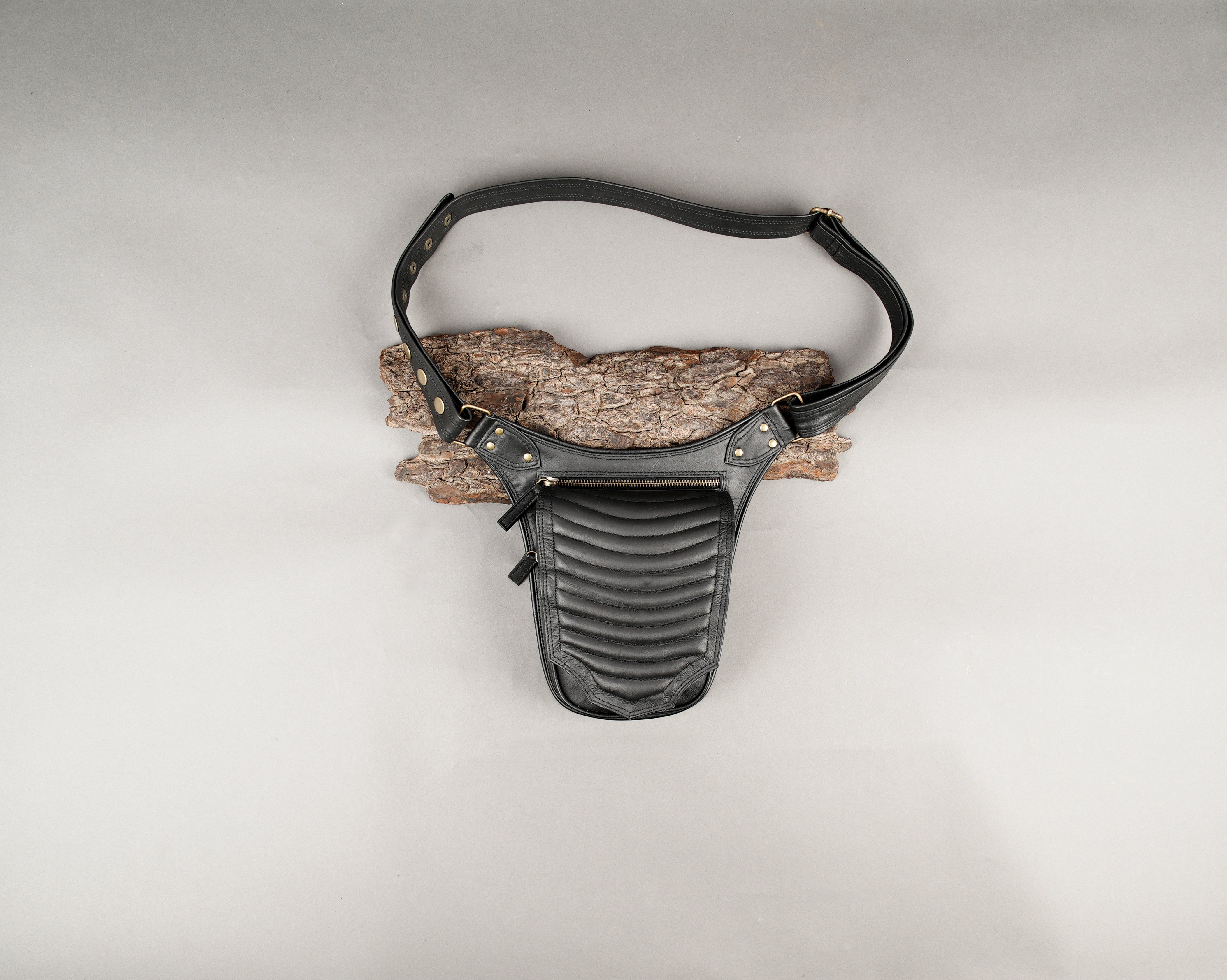 Leather utility belt bag open showing compartments