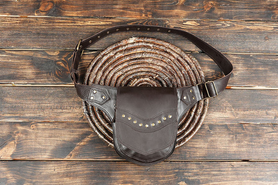 Brown leather waist belt bag with brass stud detailing