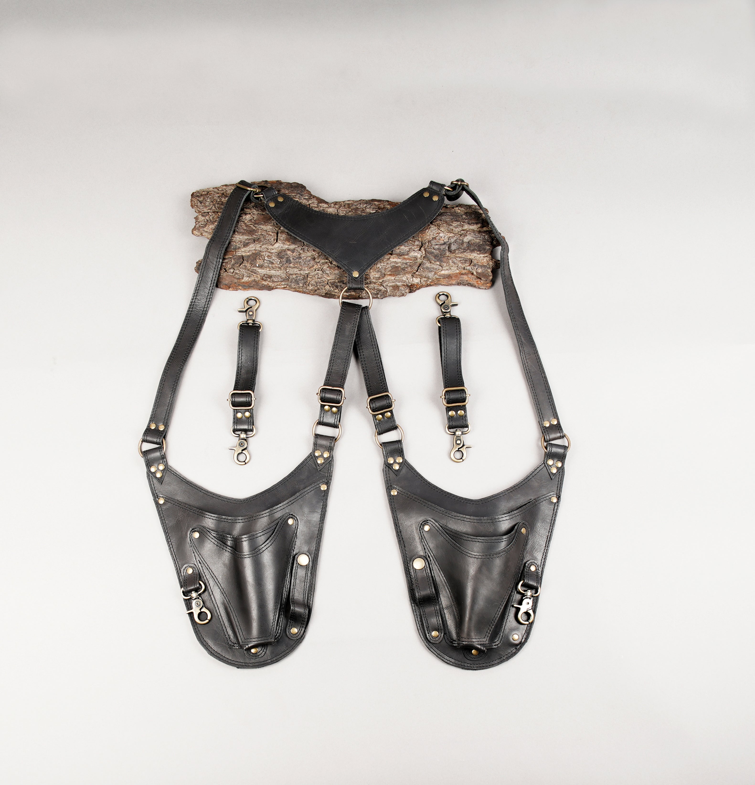 Black leather dual shoulder holster with adjustable straps