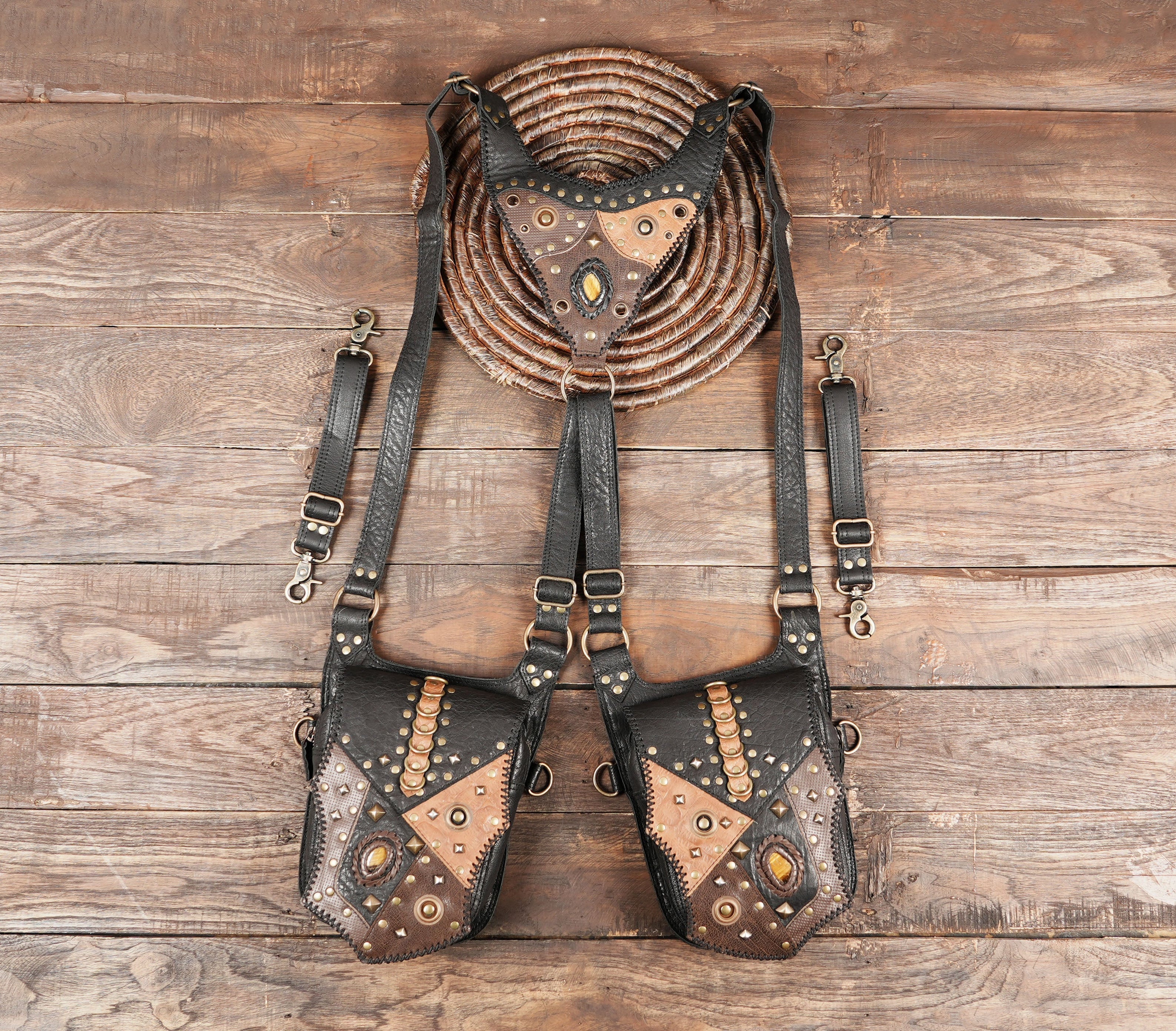 Dual pocket leather shoulder holster with antique studs with gemstone