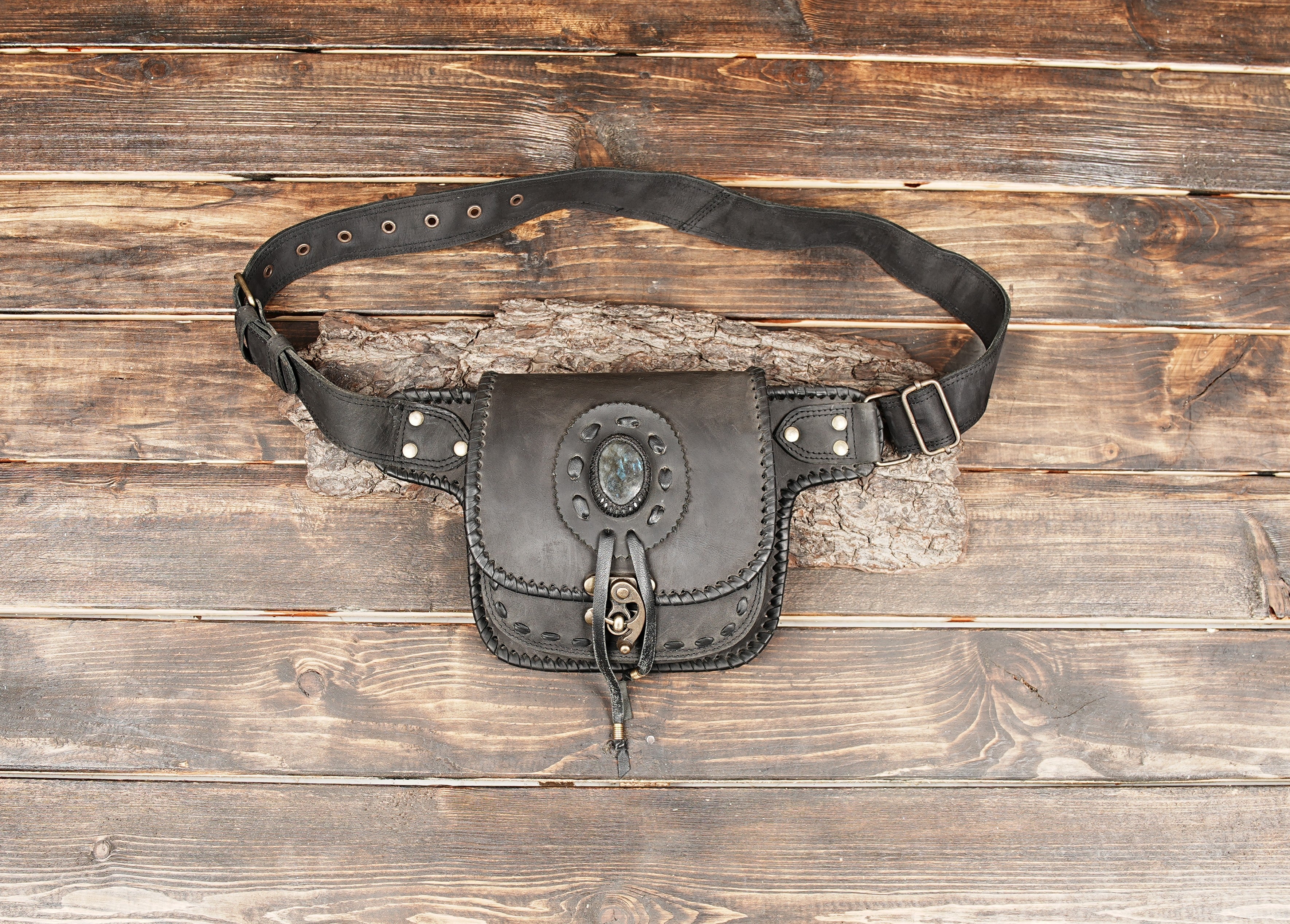 Handmade black leather waist bag with gemstone detail