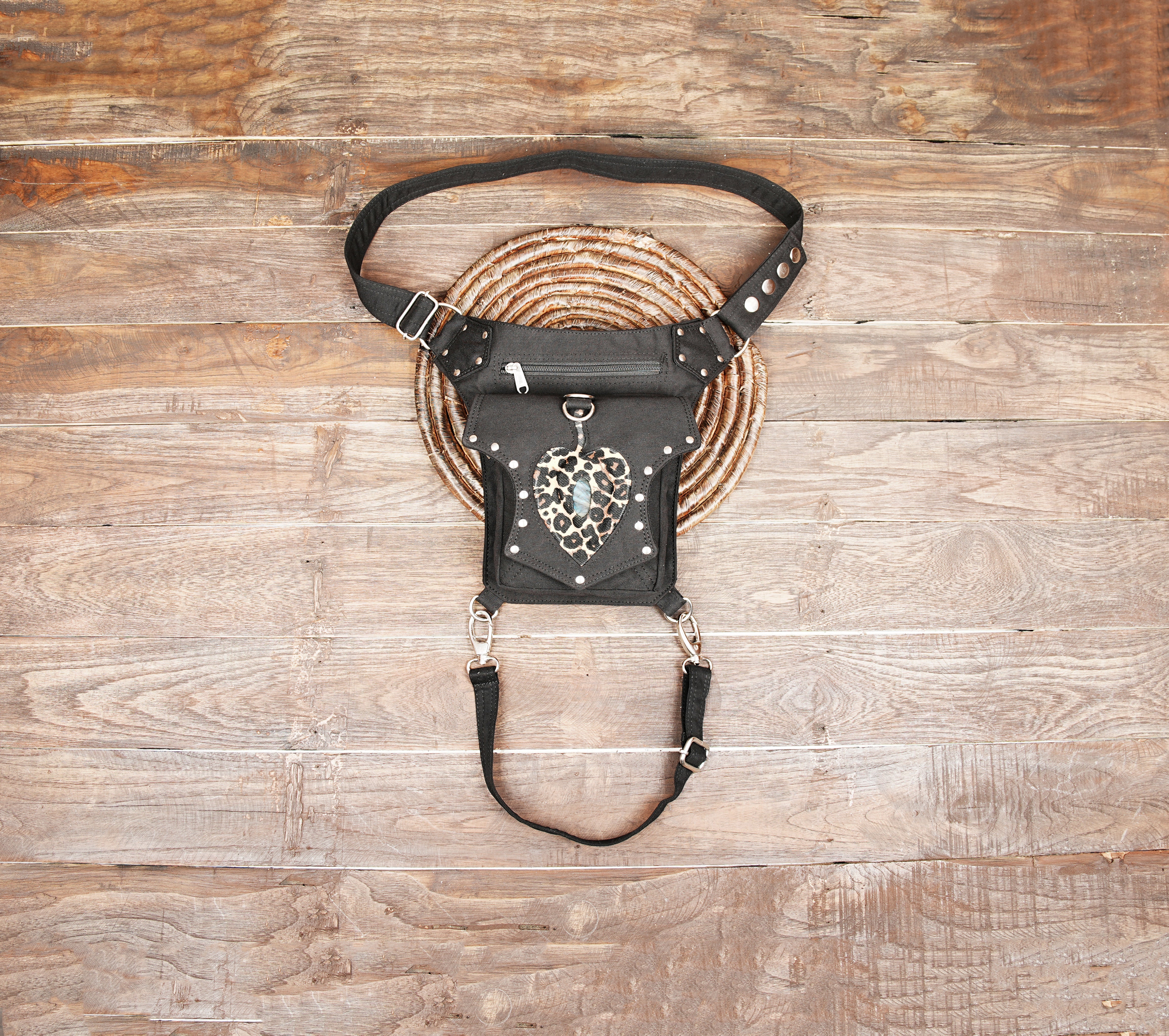 Black cotton canvas drop leg bag with leopard print heart accent