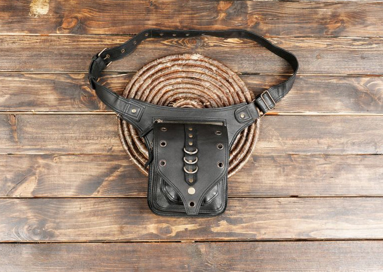 Black leather waist bag with rivets and metal ring design