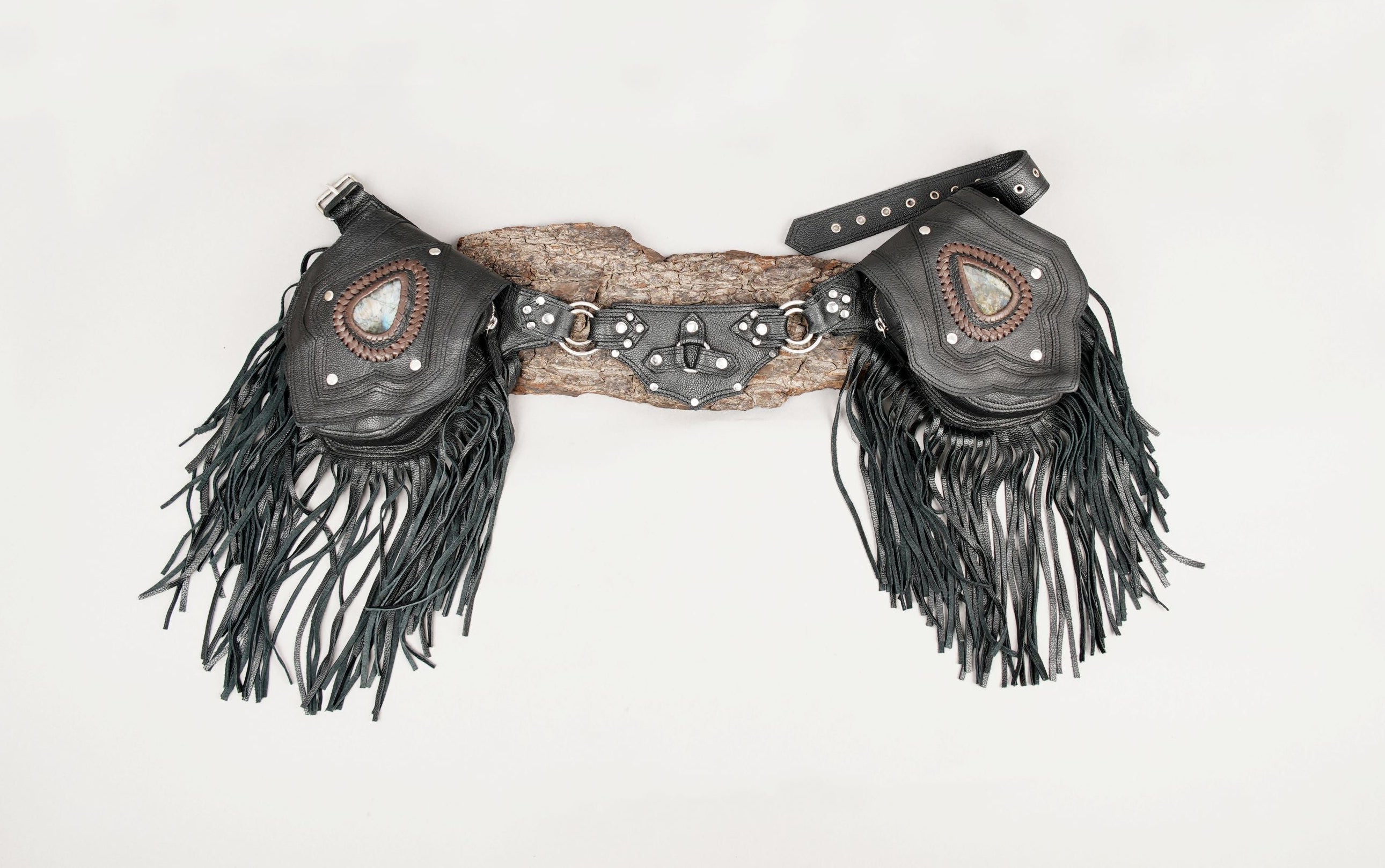 Black leather waist belt with dual fringe pouches and gemstone detail
