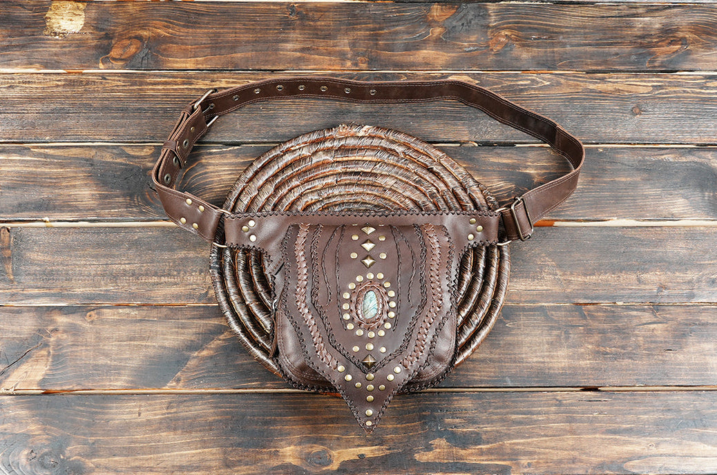 Black leather hip pouch with brass rivets and gemstone inlay