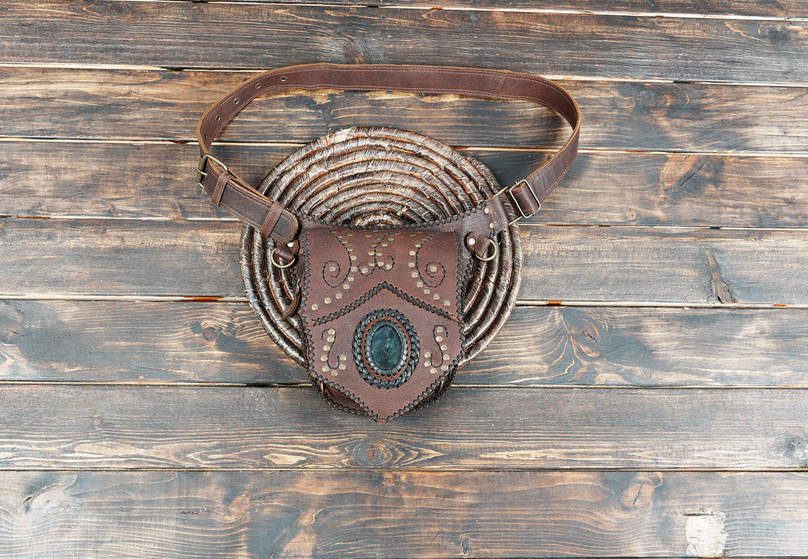 Handmade brown leather waist belt with woven basket pouch
