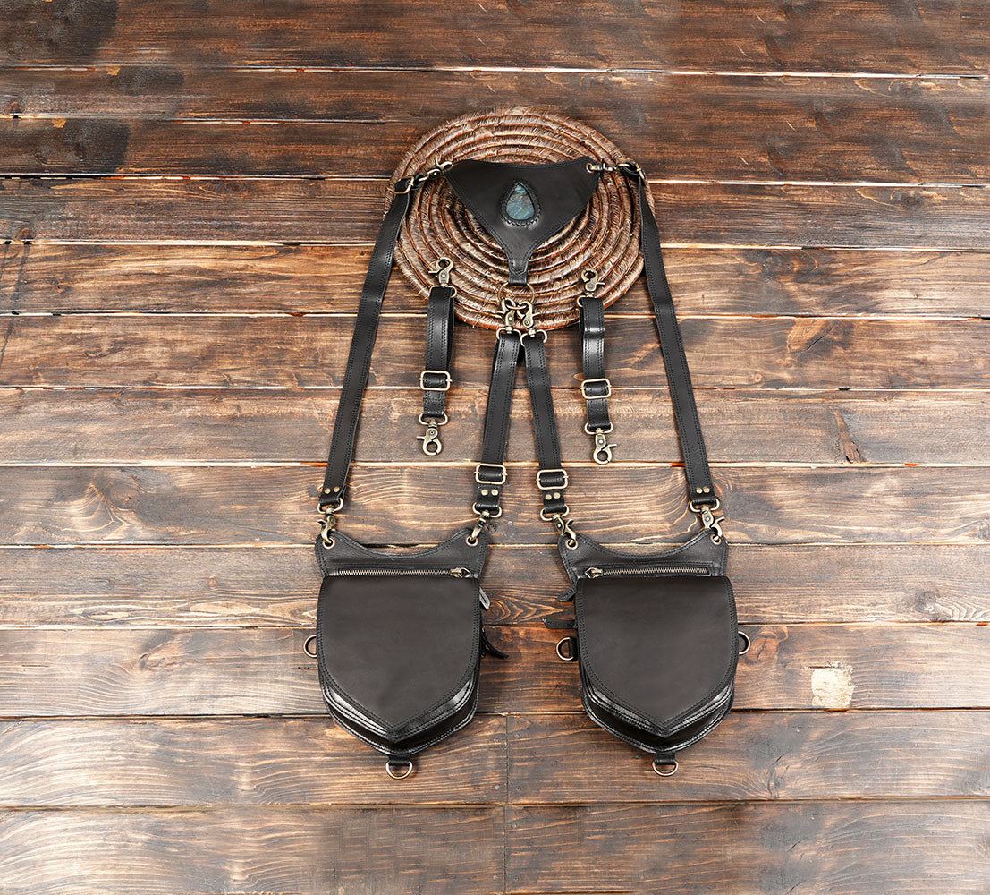 Modern black leather dual holster with gemstone detail and adjustable straps