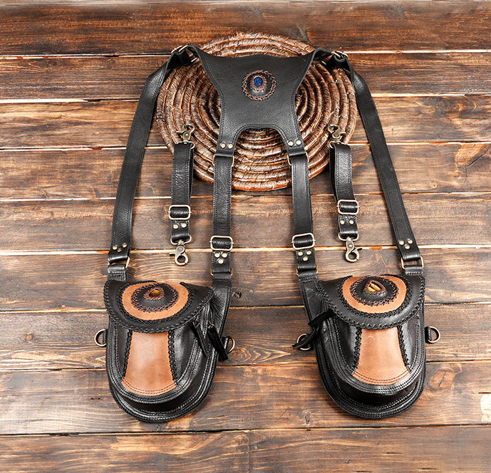 Handmade black leather dual holster with circular accent design