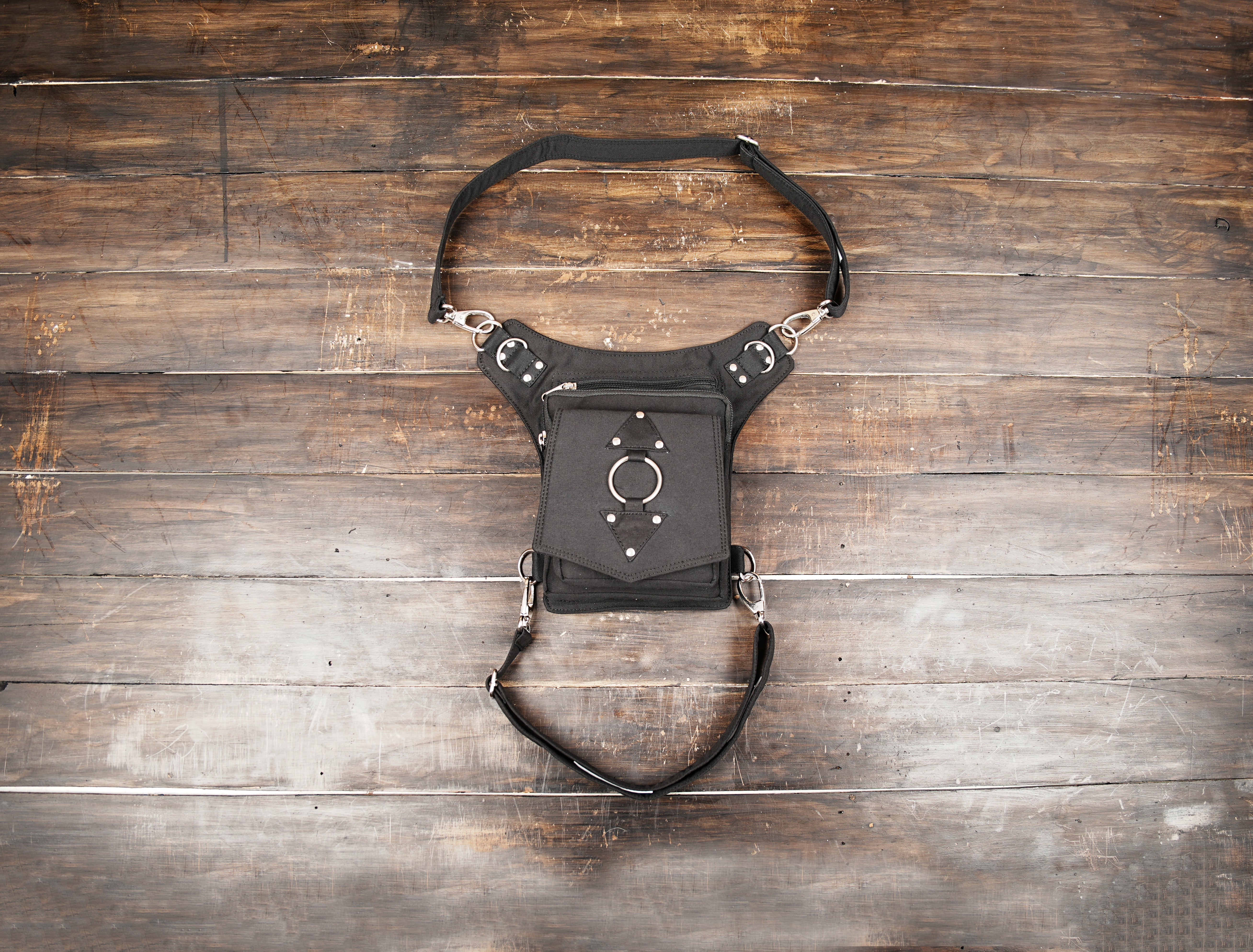 Black cotton thigh support belt bag with utility pouch and adjustable leg strap