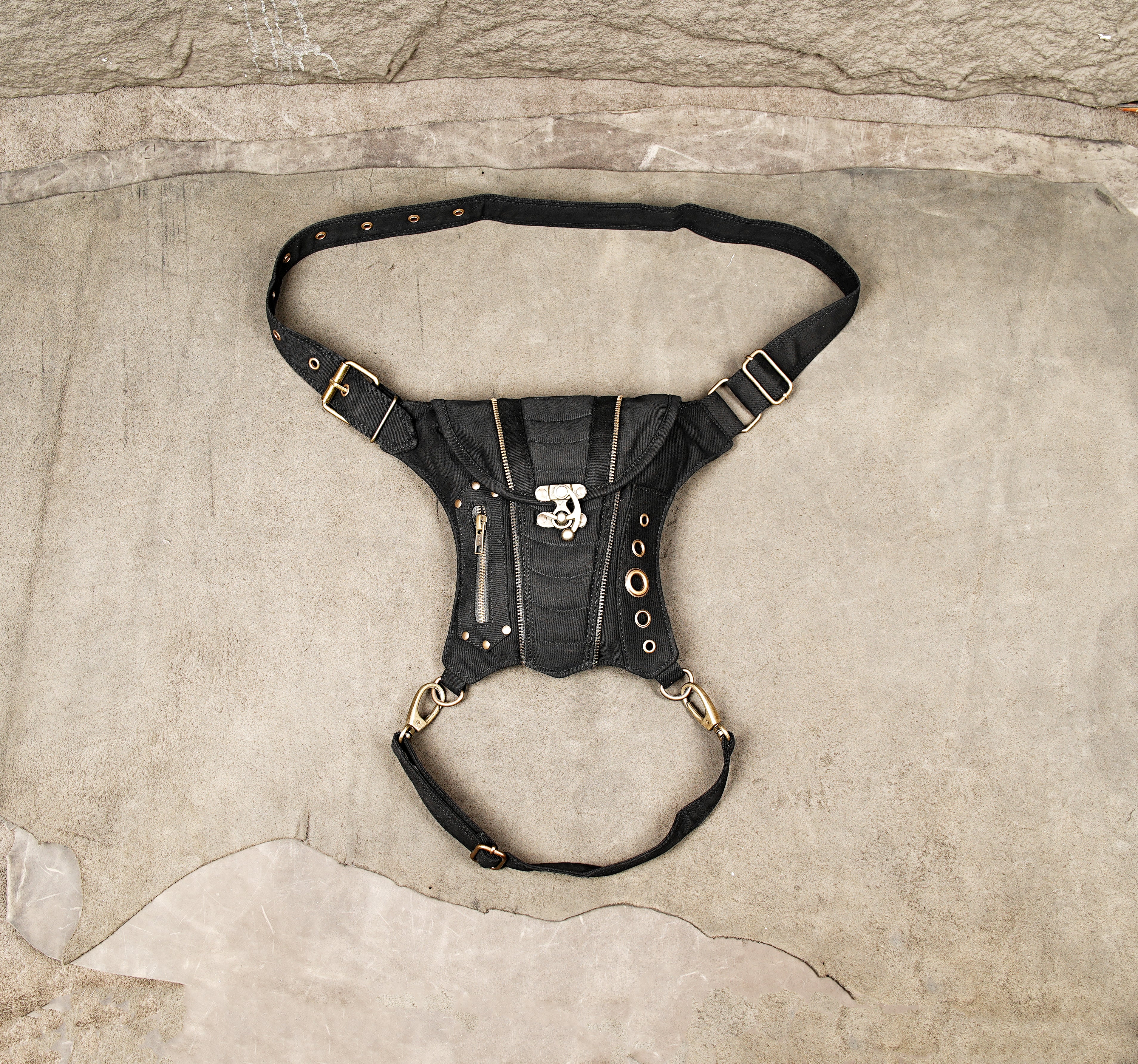 Black cotton waist belt bag with zipper pockets and brass hardware