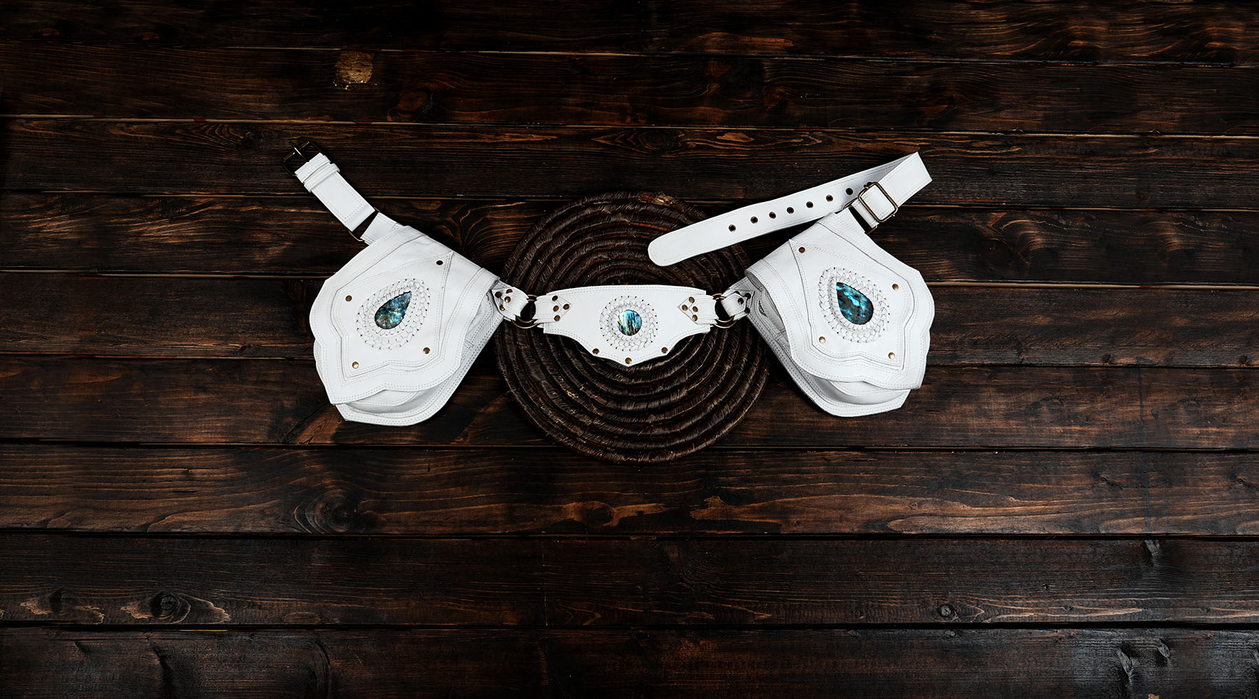 Hand-stitched leather waist bag with crystal centerpiece