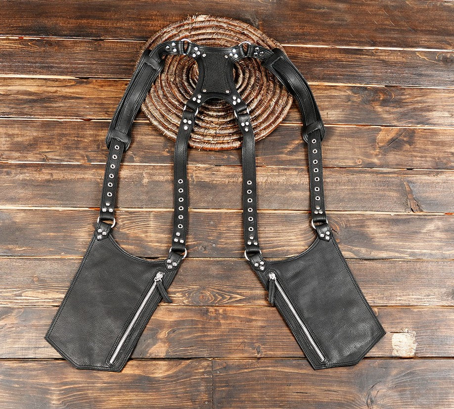 Men’s black leather shoulder holster bag on wood background