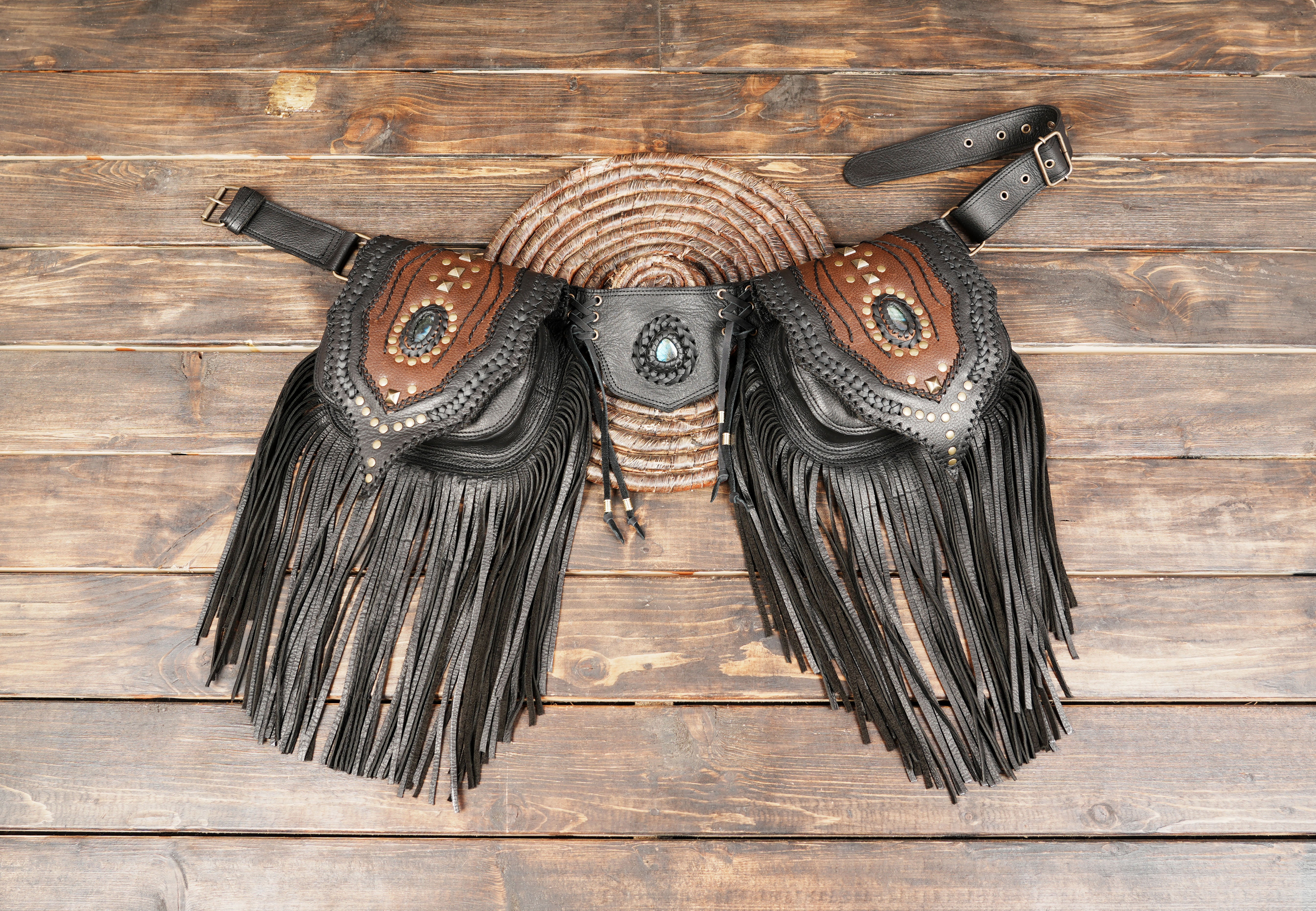 Handmade leather waist belt with black fringe, brown panels, and studded gemstone details