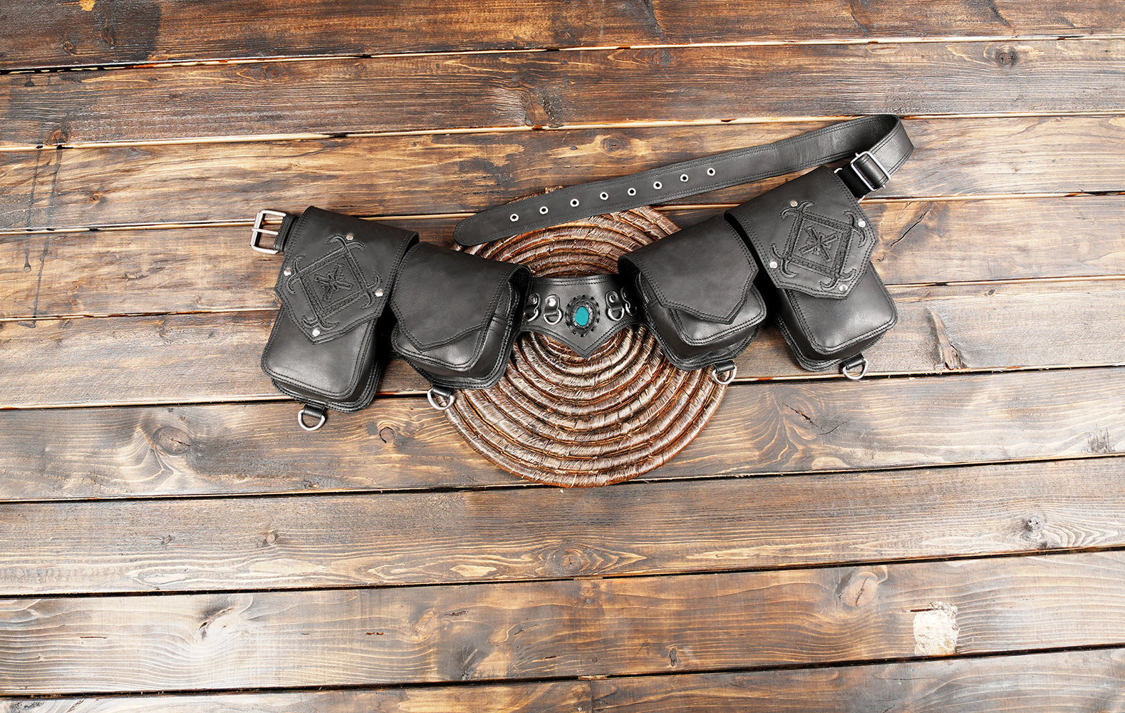 Handcrafted black leather utility belt with turquoise stone centerpiece