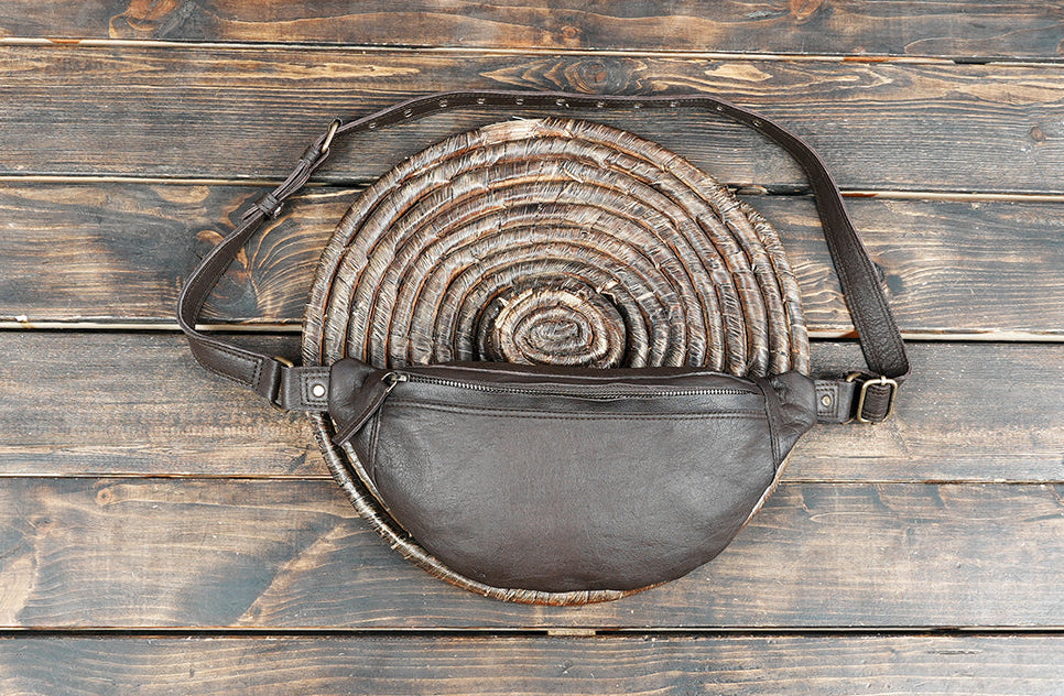 Genuine leather waist belt bag with adjustable strap and zip closure