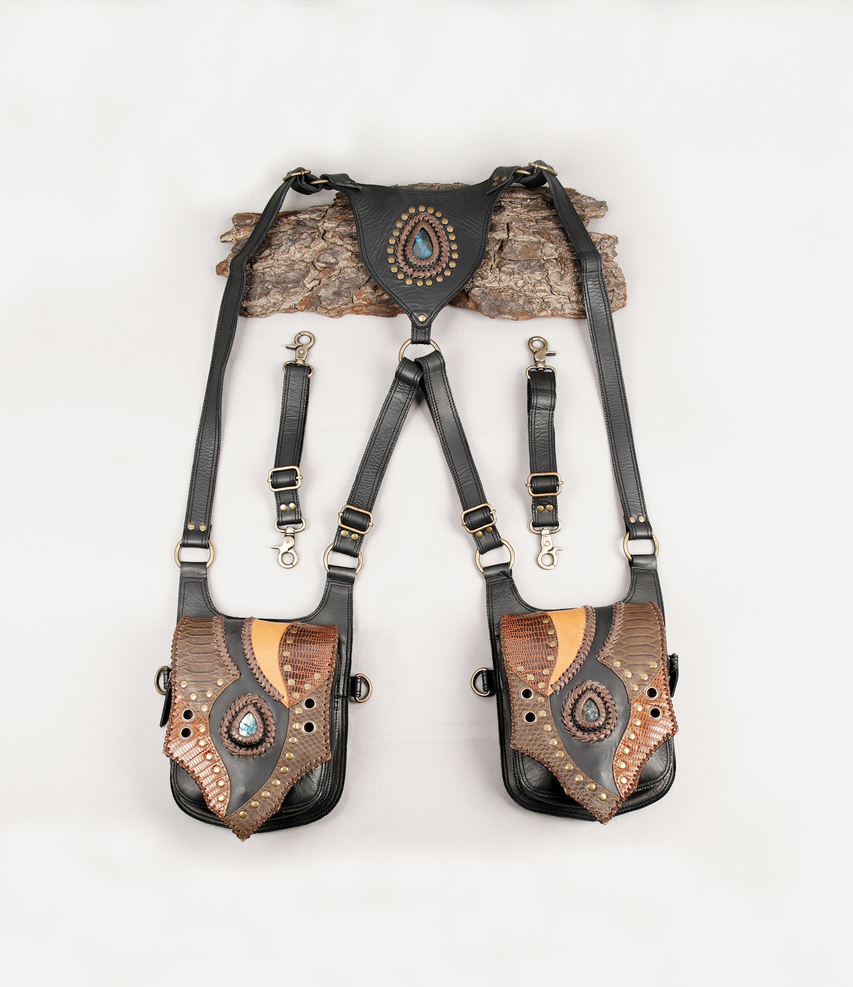 Handcrafted leather shoulder holster with gemstone detailing