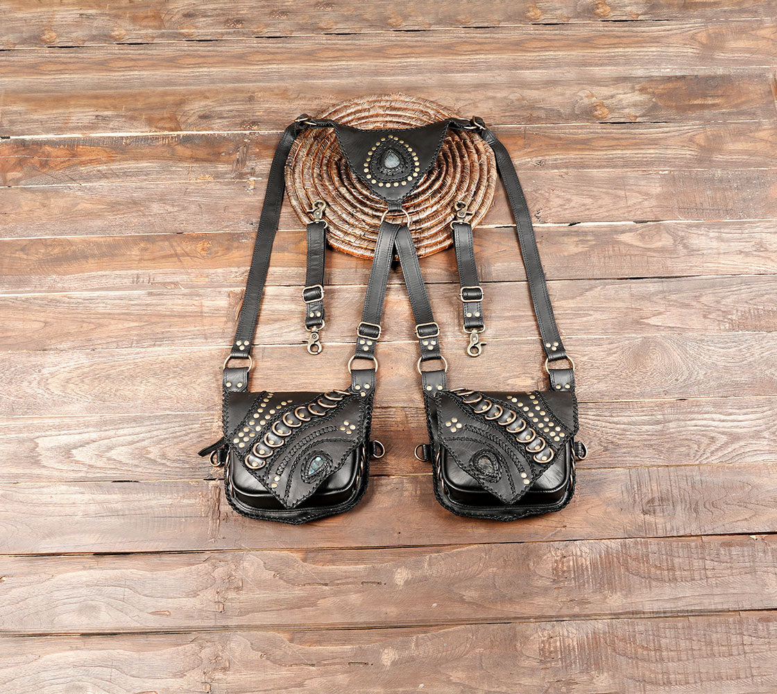 Black leather holster bag with gemstone and brass studs