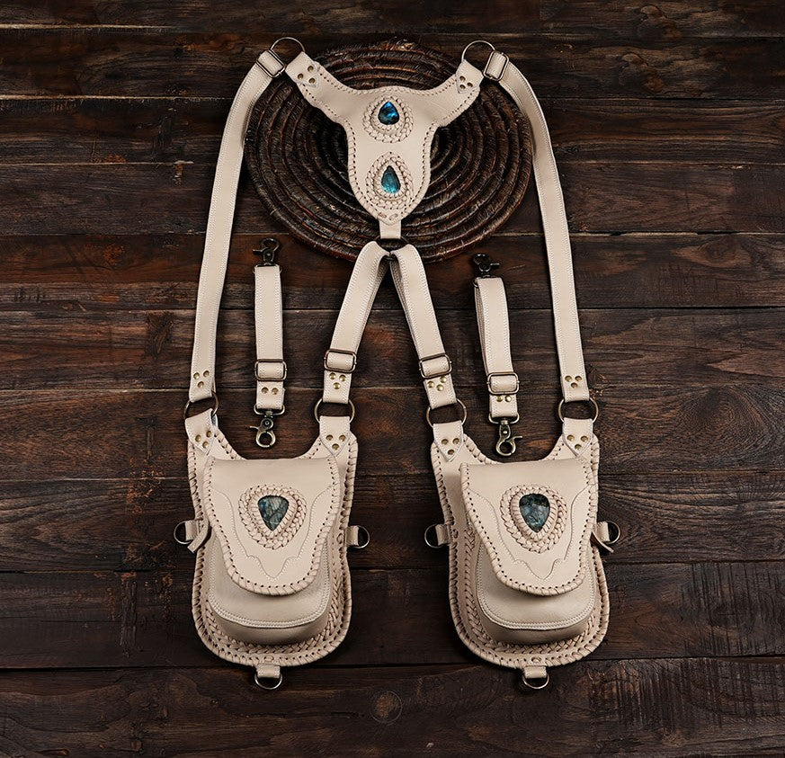 Bohemian white leather holster harness with ornate stitching and gemstone detail