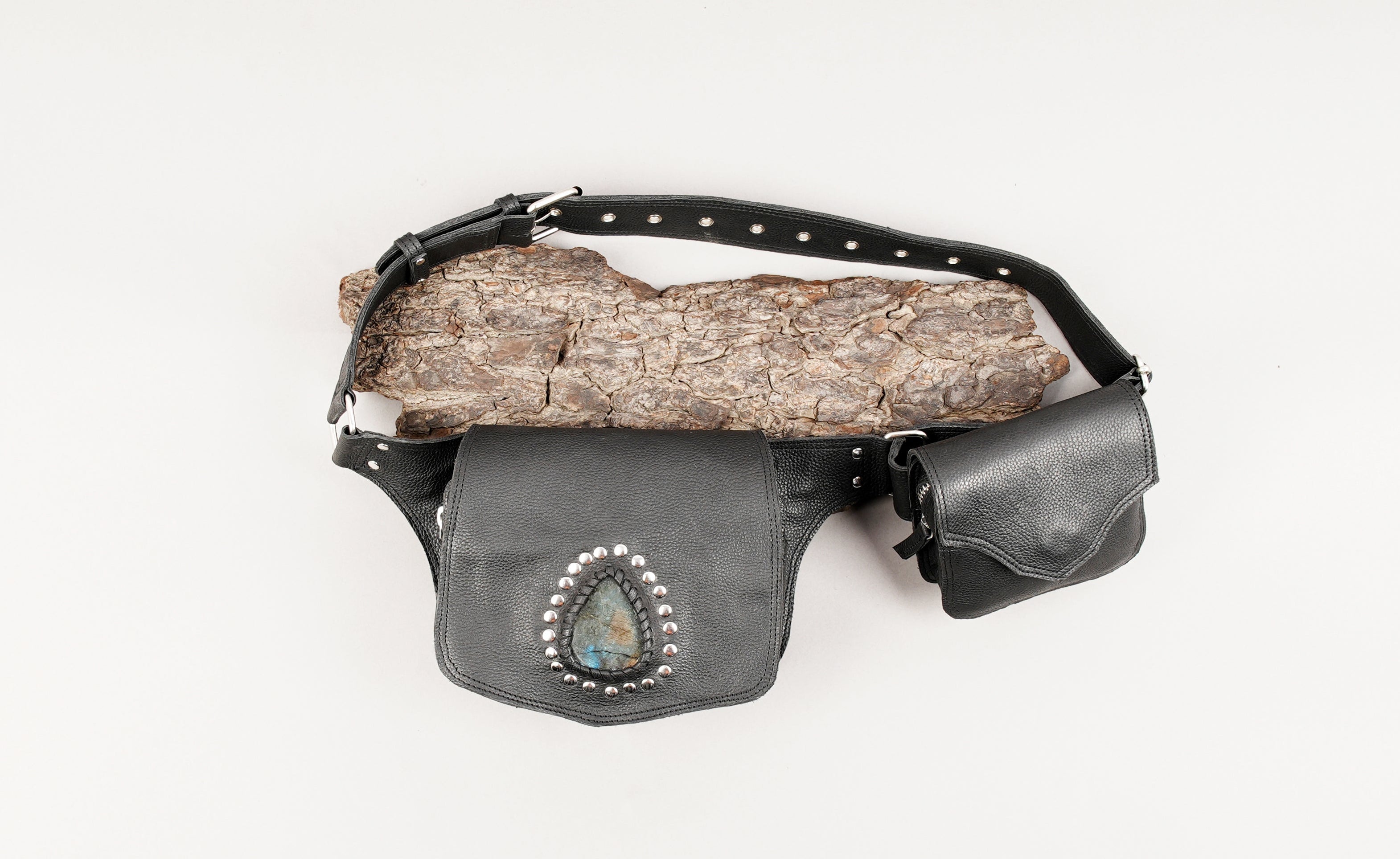 Black leather waist belt with stone accent utility pouch