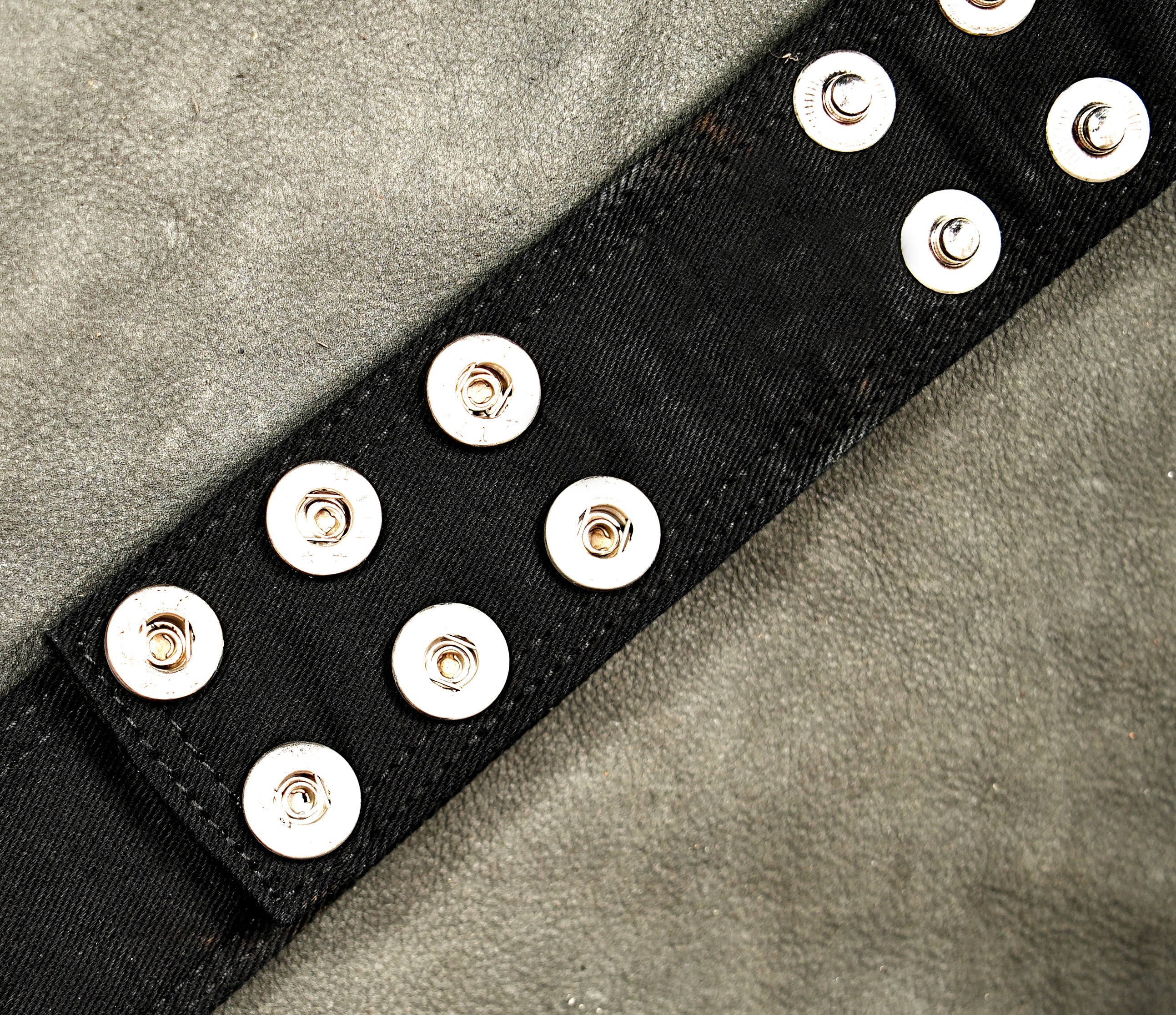 Black cotton waist belt with zippered pocket and studded trim