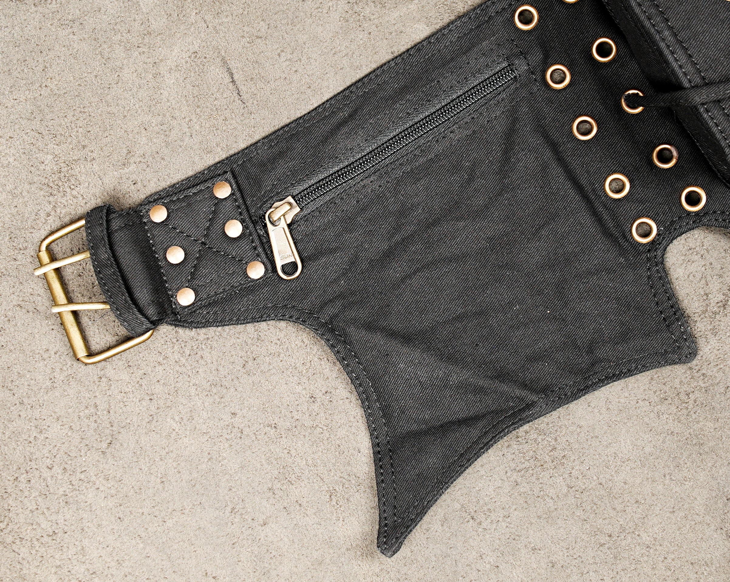 Unisex black cotton hip bag with lace-up detail and hardware
