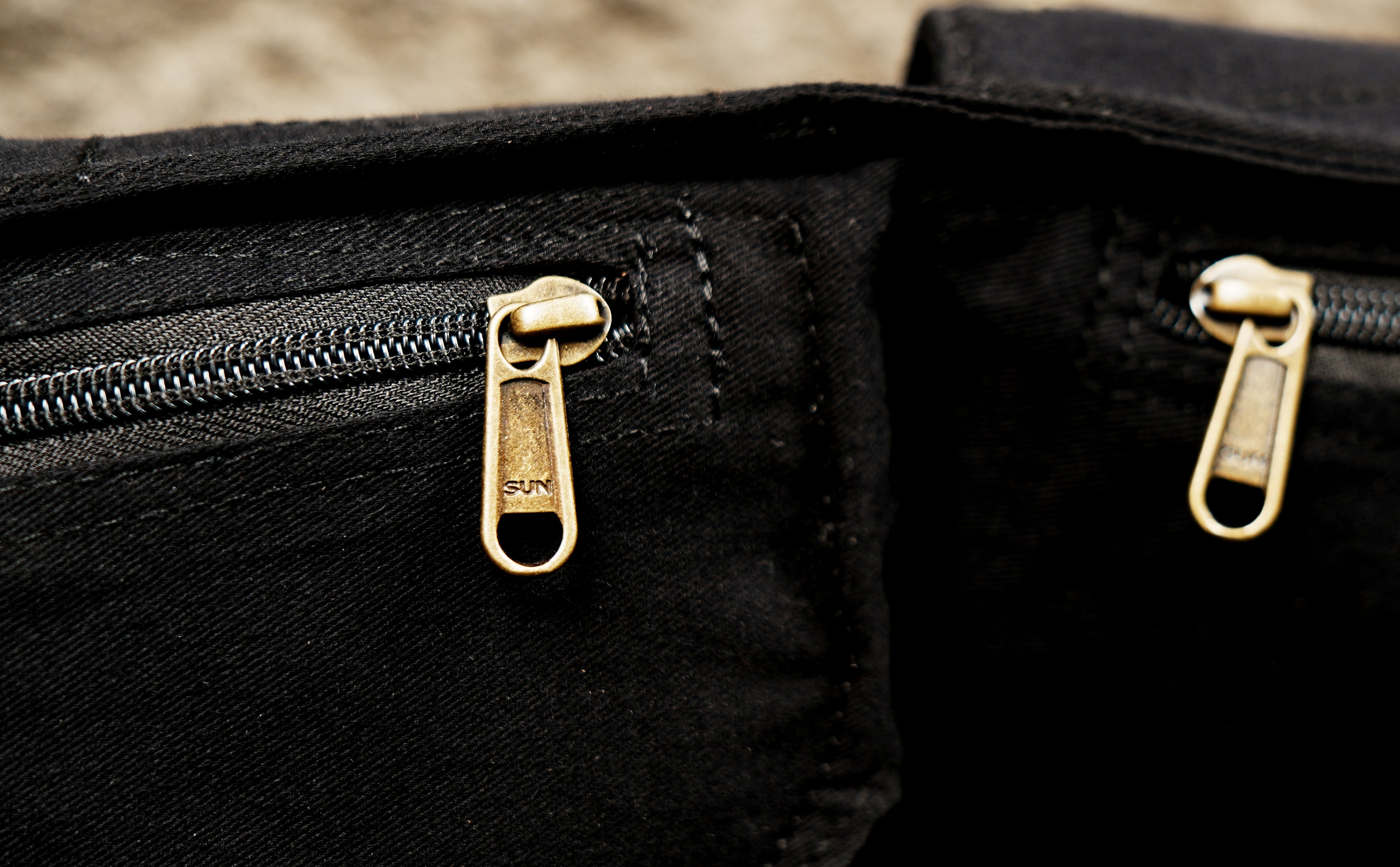 Boho hip belt bag in black canvas with two zippered pockets