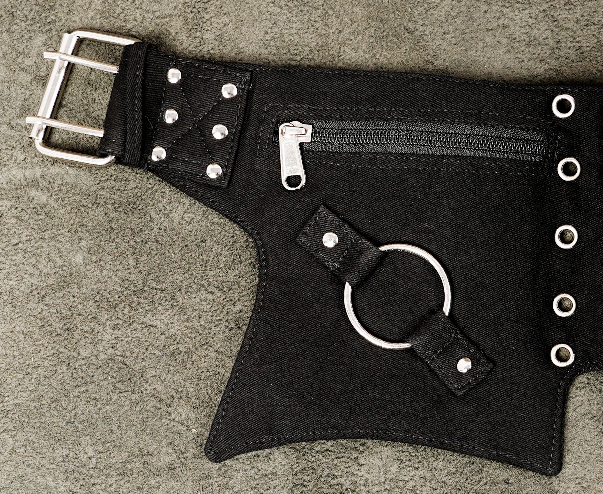 Men's and women's black utility belt with eyelet strap and roller buckle