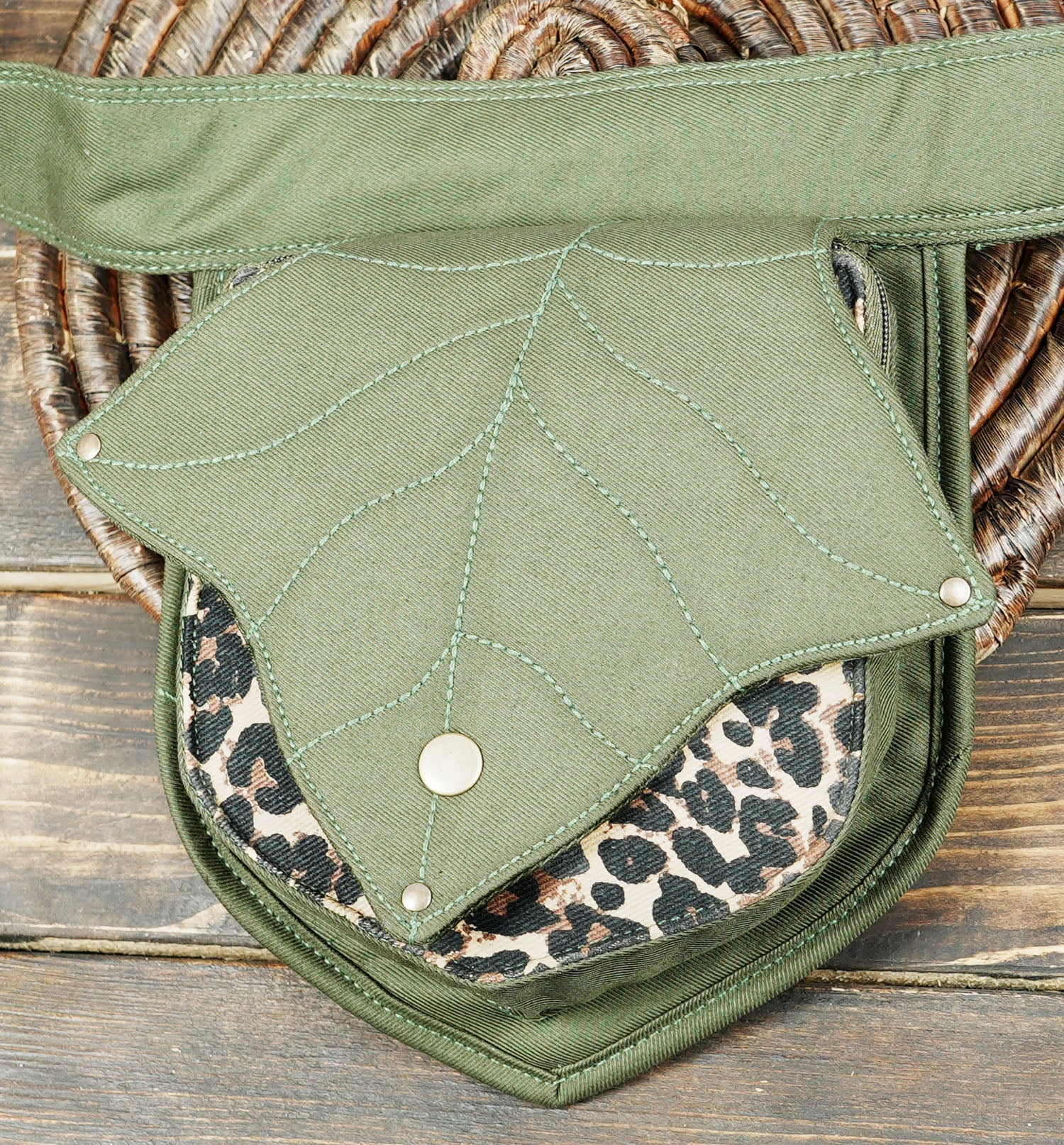 Boho-chic hip belt pouch made of rugged canvas and leopard-patterned trim