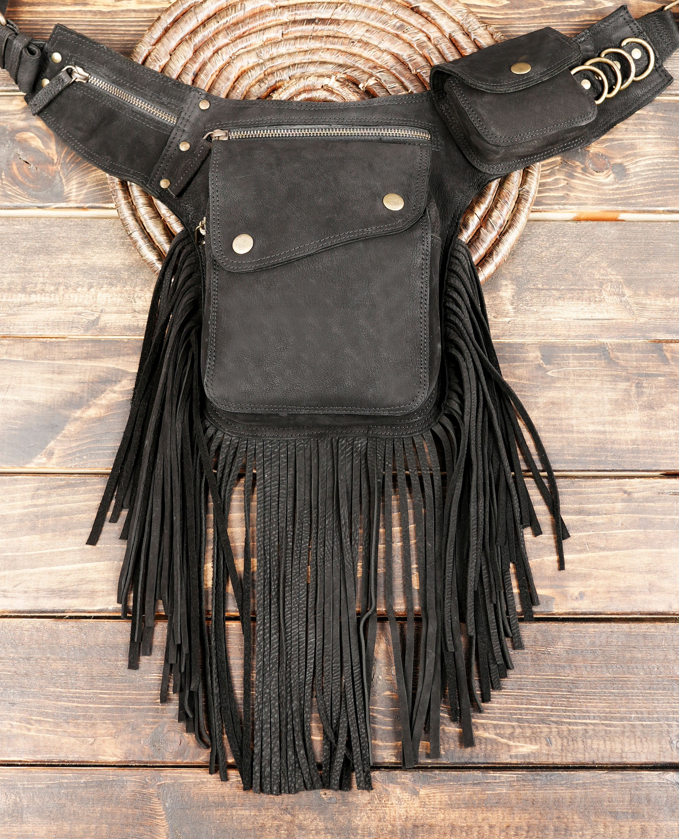 Open cotton waist bag showing multiple compartments with phone and wallet